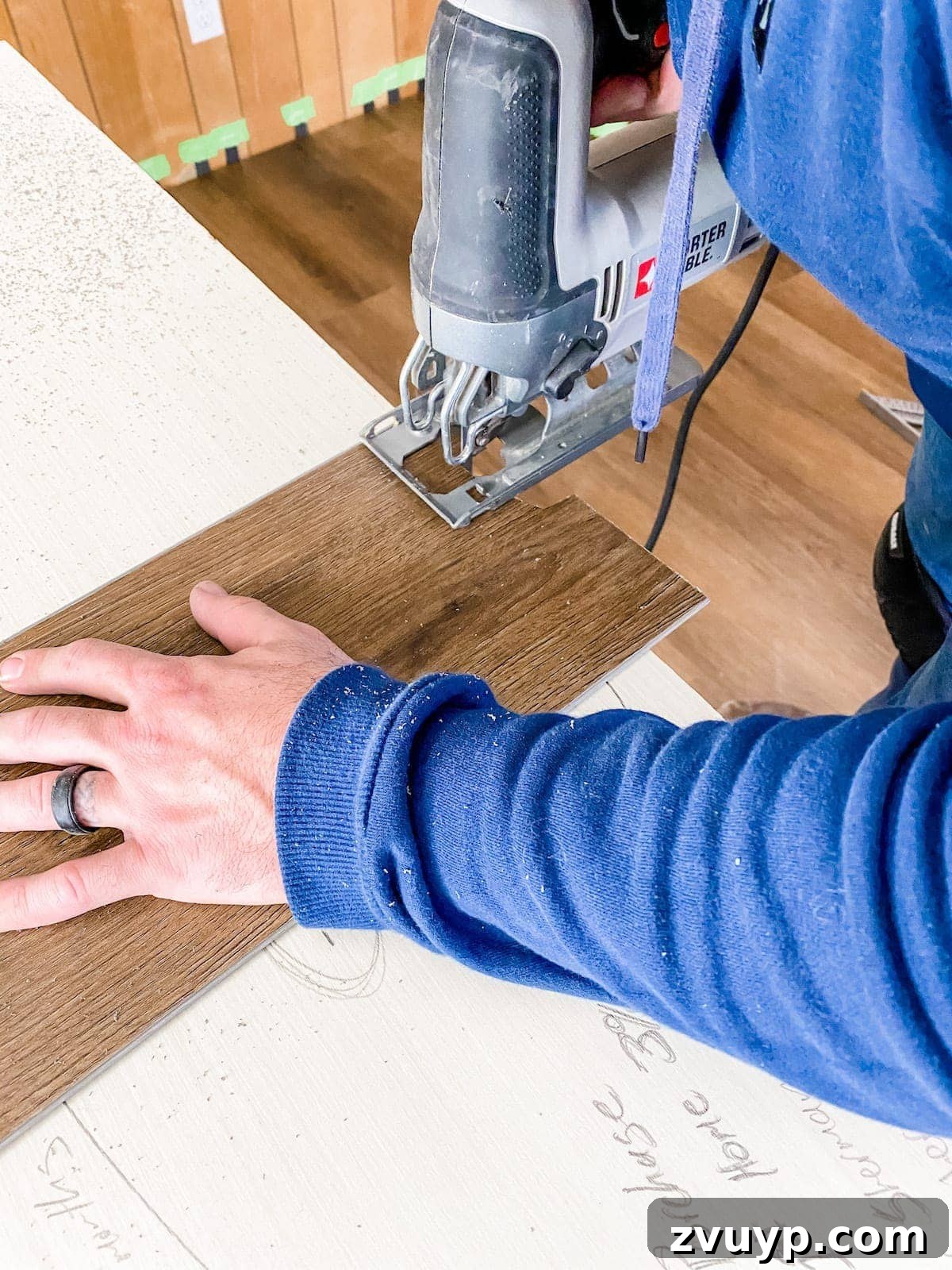 The best tool for making odd cuts: tracing the contour onto the LVP plank