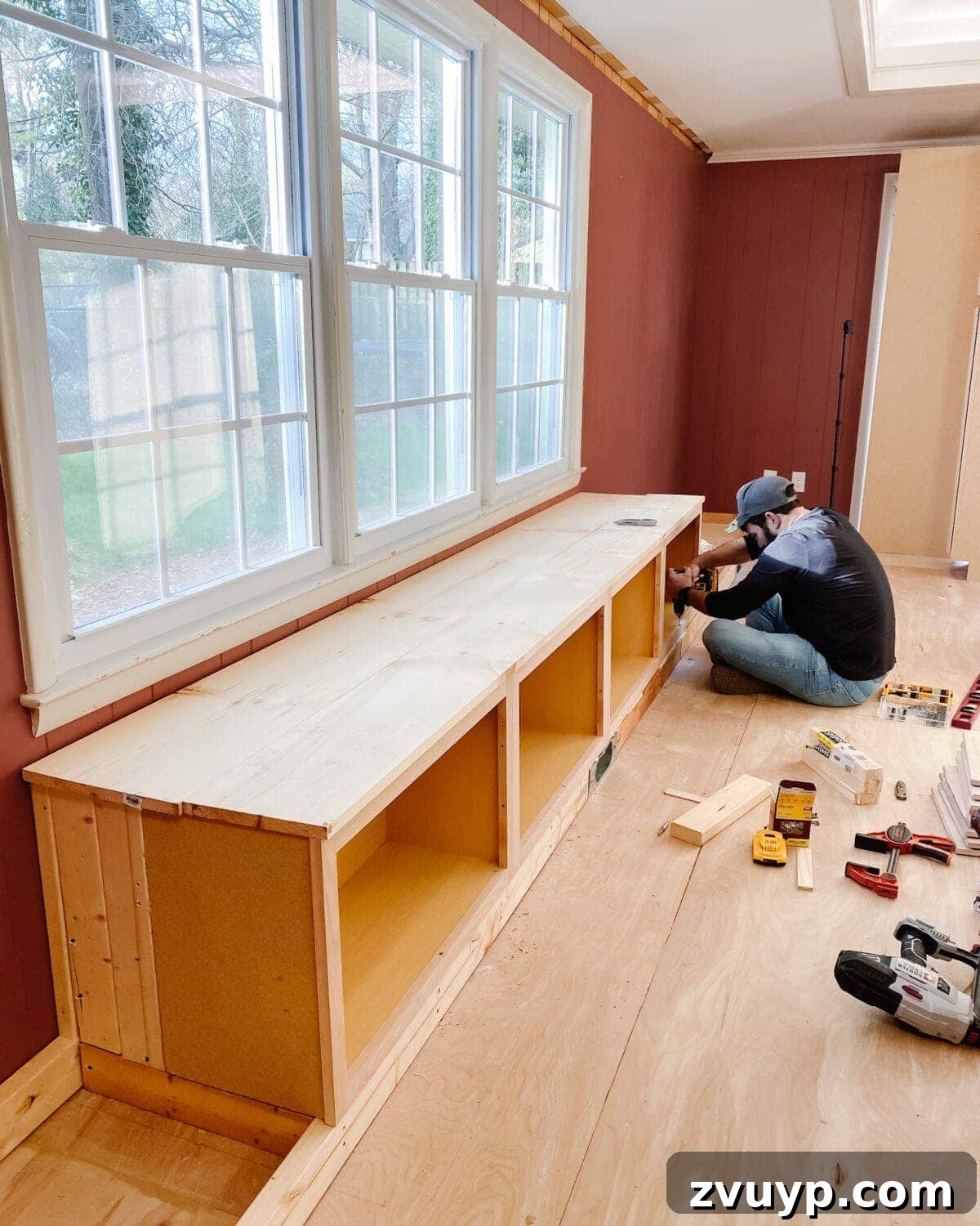 DIY Custom Built-In Storage and Window Nook 18 Pine boards forming the sturdy top surface of the DIY window seat