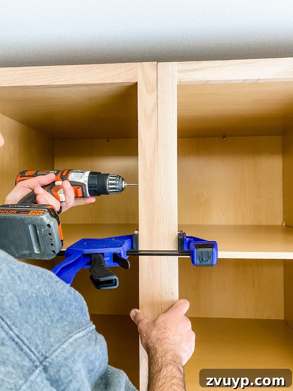 DIY Custom Built-In Storage and Window Nook 25 Close-up of cabinet frames screwed together for a seamless built-in look