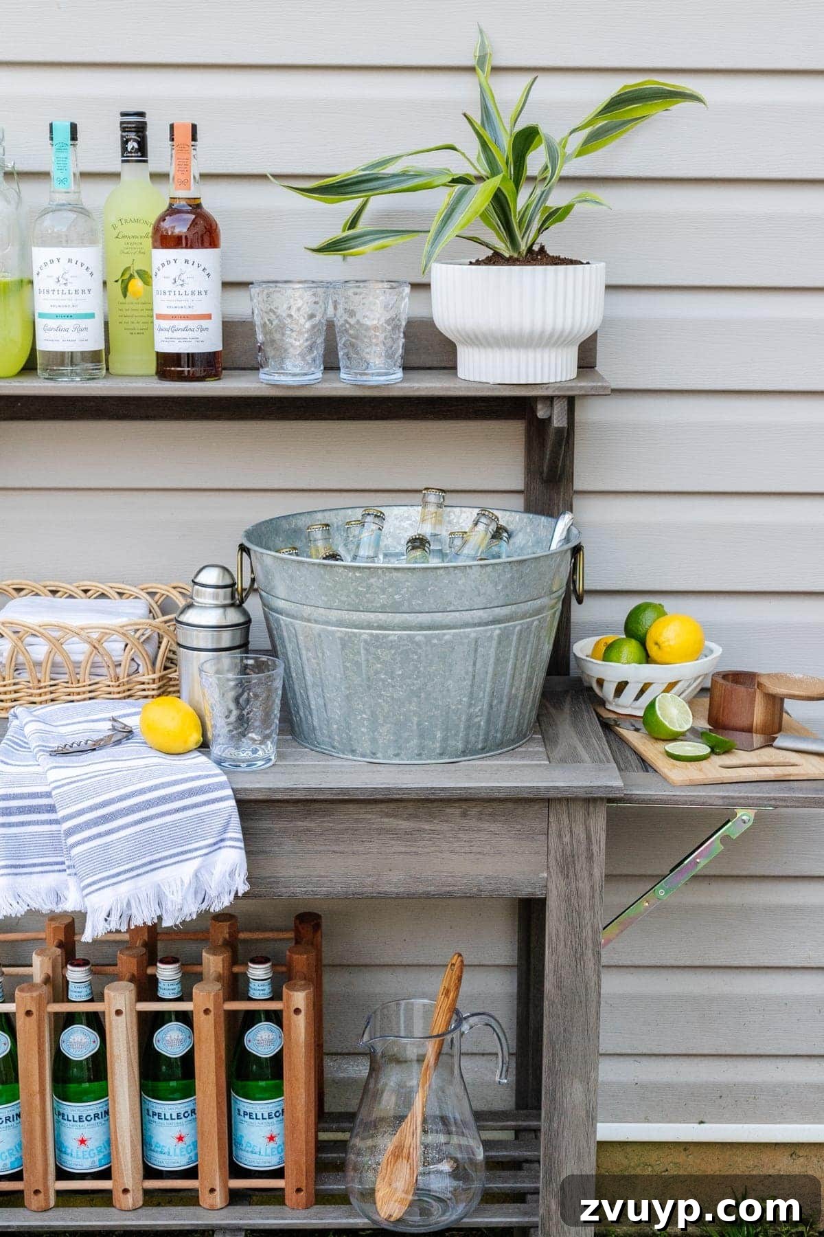 Budget-Friendly Backyard Oasis 8 potting bench used as an outdoor bar