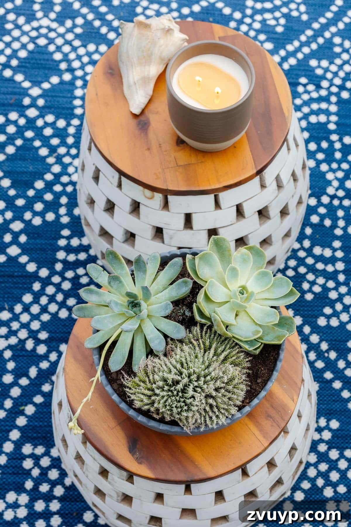 Budget-Friendly Backyard Oasis 9 garden stools used as tables with plants and candles on top