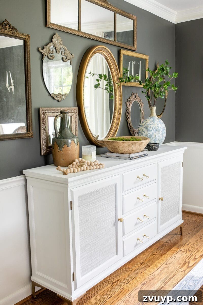 Timeless Gold Mirrors Elegance for Every Budget 2 Elegant antique gold mirror gallery wall above a classic dining room buffet, enhancing timeless decor.