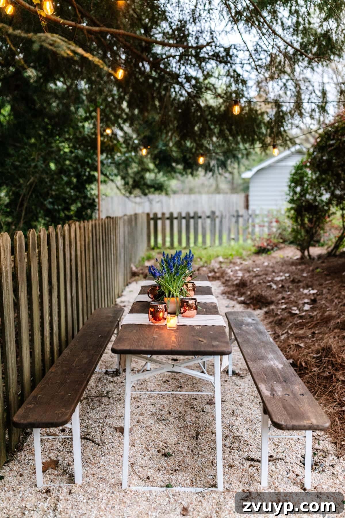 Brewing a Backyard Haven: DIY from Neglect 4 Hanging string lights on wooden dowels for a DIY backyard dining area