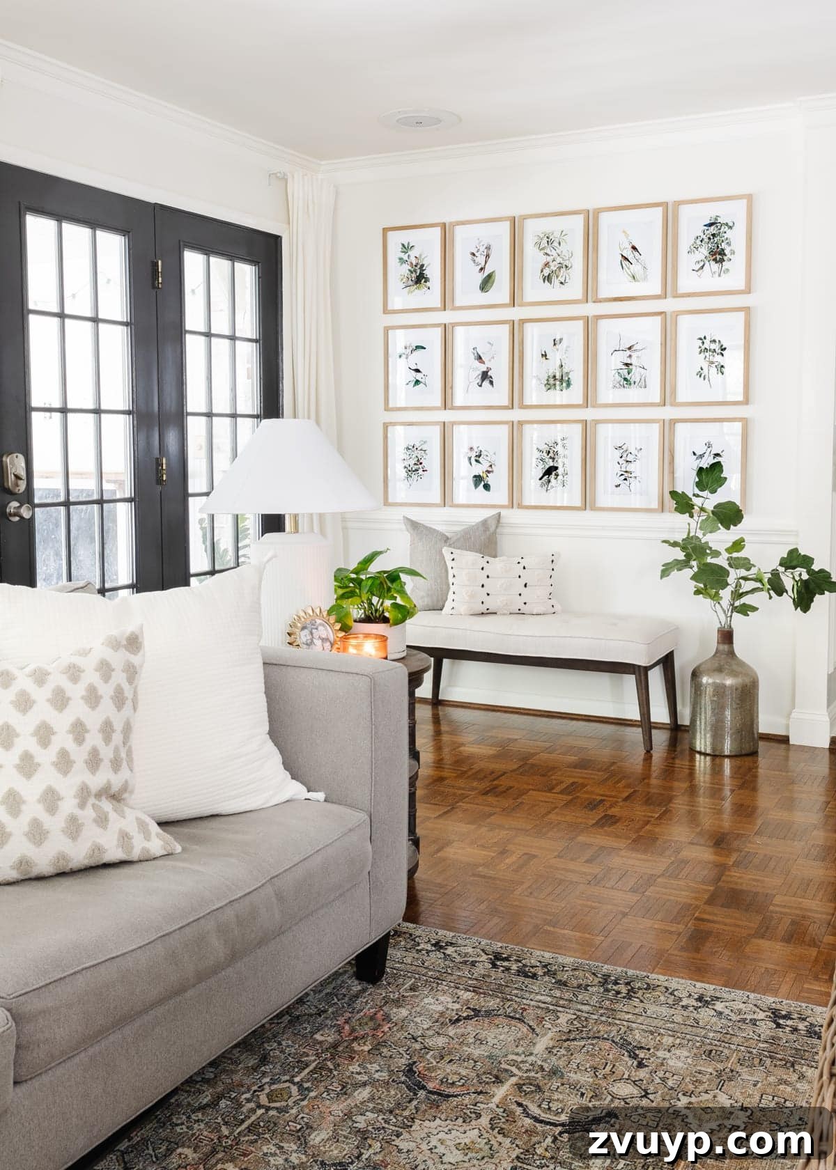 Audubon's Avian Art: Free Printable Gallery for Your Walls 2 Elegant entryway featuring a spring gallery wall with framed Audubon bird prints, a cozy bench, lamp, and natural accents.