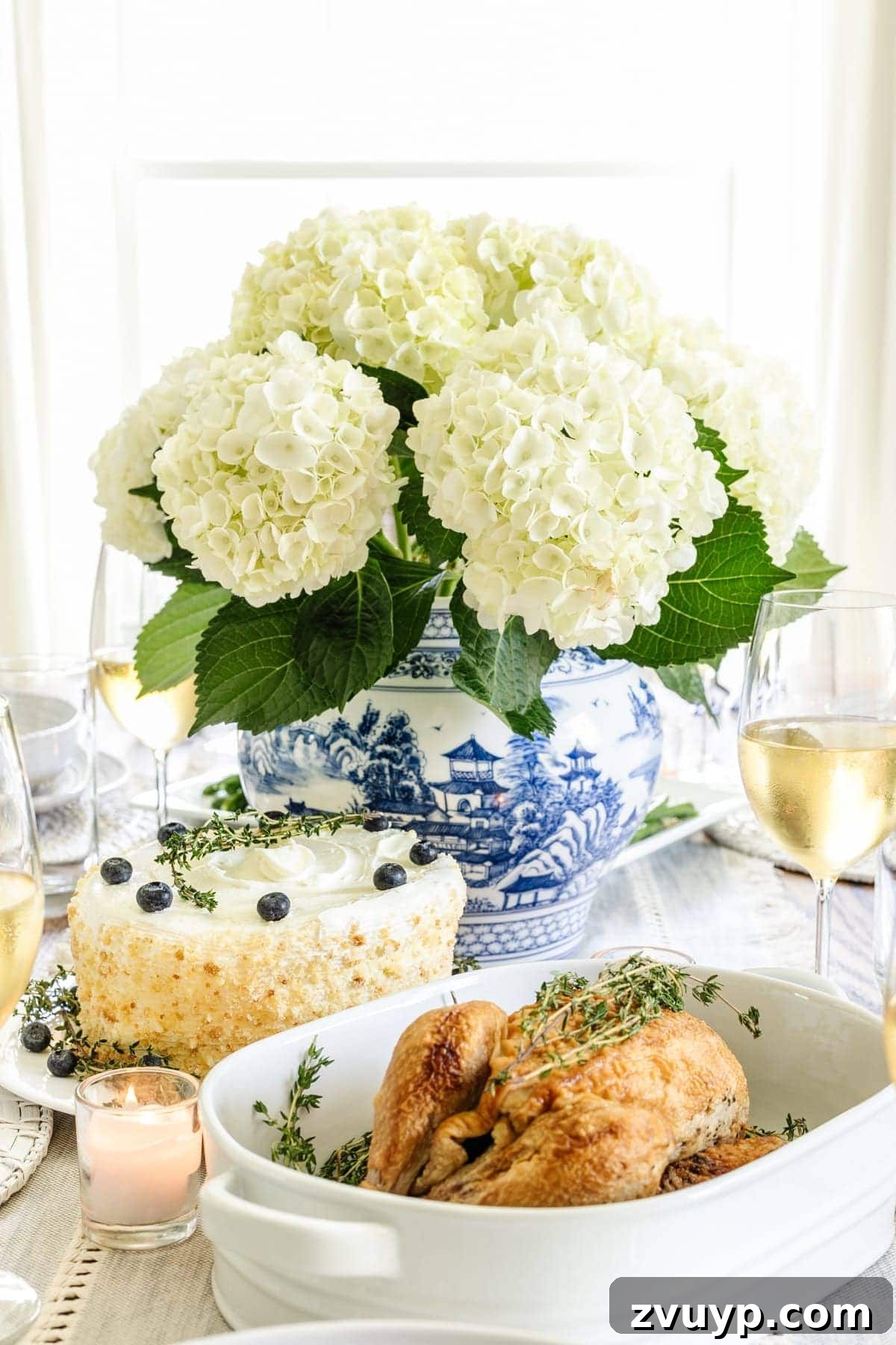 Stylish Dining Table Decor on a Budget Plus Affordable Dinnerware Gems 4 Classic Chinoiserie Blue Willow vase as a centerpiece