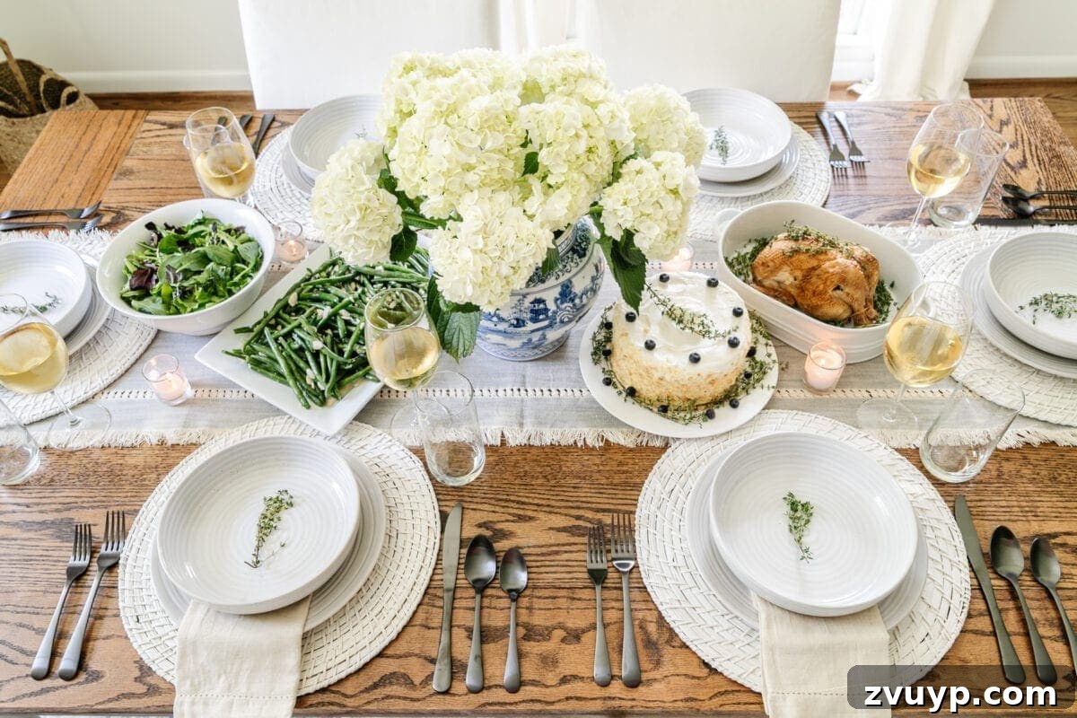 Stylish Dining Table Decor on a Budget Plus Affordable Dinnerware Gems 6 Mother's Day tablescape with modern traditional style and Chinoiserie vase