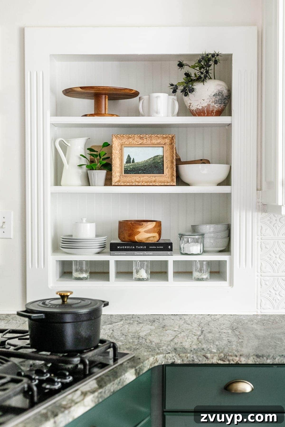 From Thrift to Treasure: Easy Art You Can Make 4 Kitchen shelf decor featuring DIY abstract art painting in an antique gold frame, adding a personalized touch to the home.