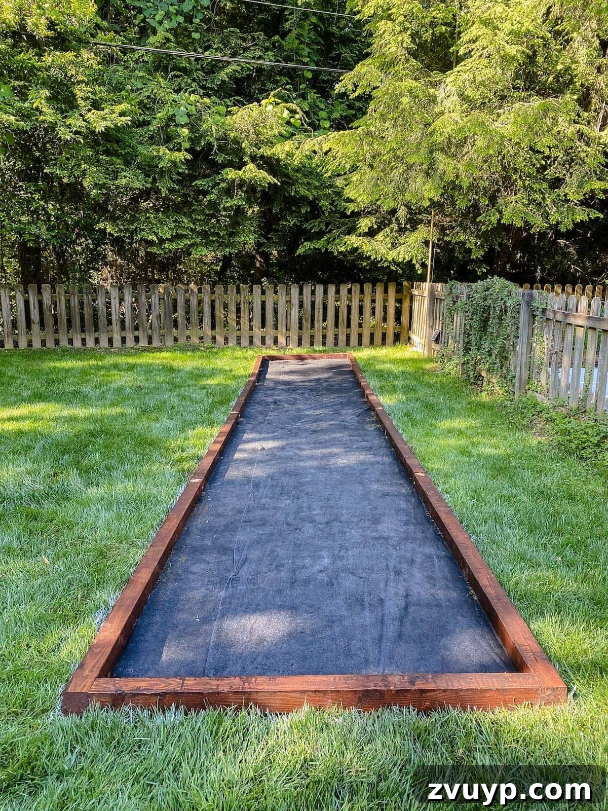 Get Rolling Build a Bocce Court in a Weekend 16 Completed bocce ball court frame with weed fabric base