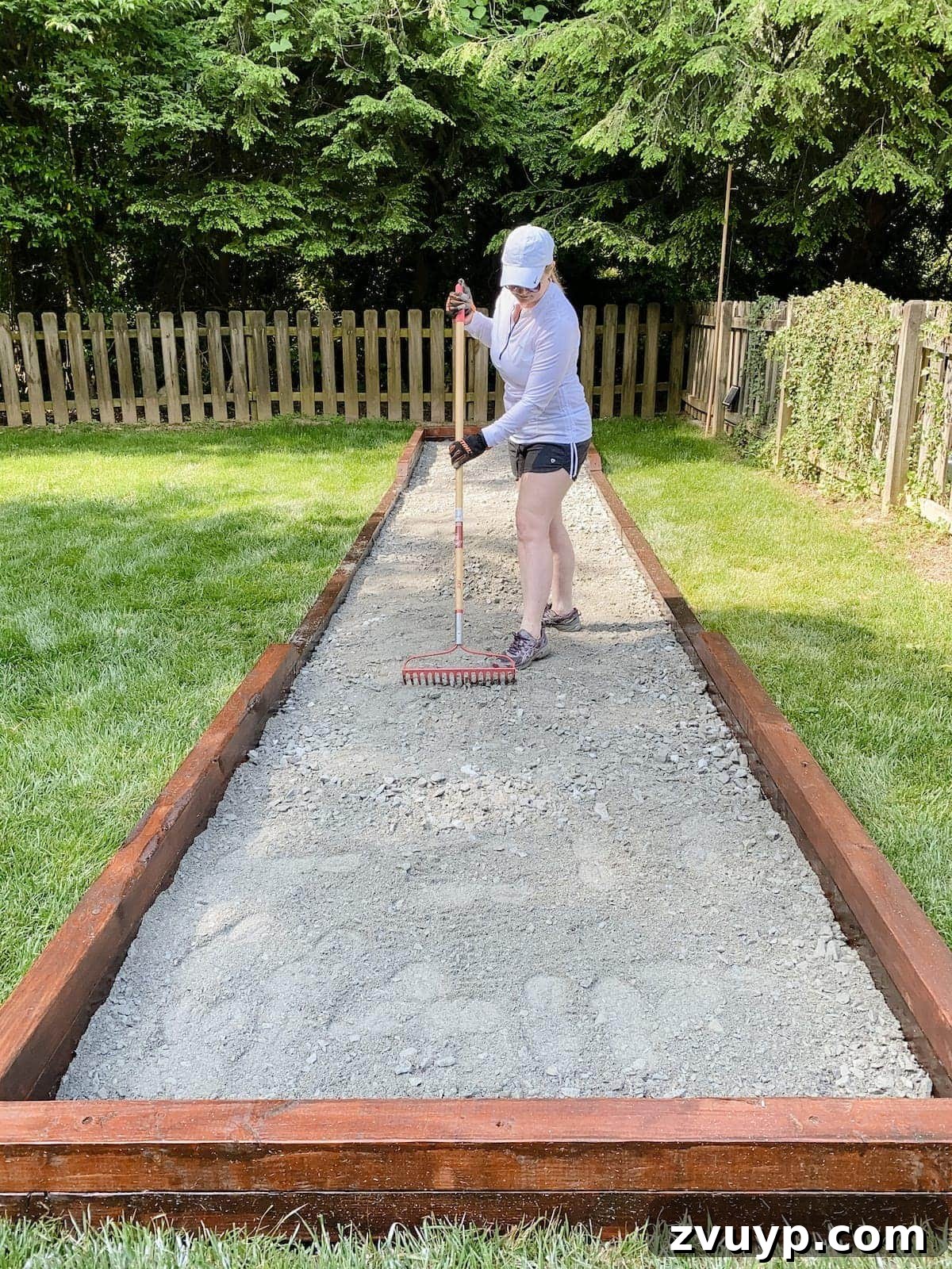 Get Rolling Build a Bocce Court in a Weekend 22 Spreading and leveling the paver base for the bocce ball court