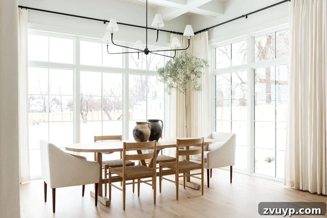 Elevating Our Dining Room: A Modern Classic Refresh 6 Studio McGee dining room featuring an elegant oval dining table and modern chairs.