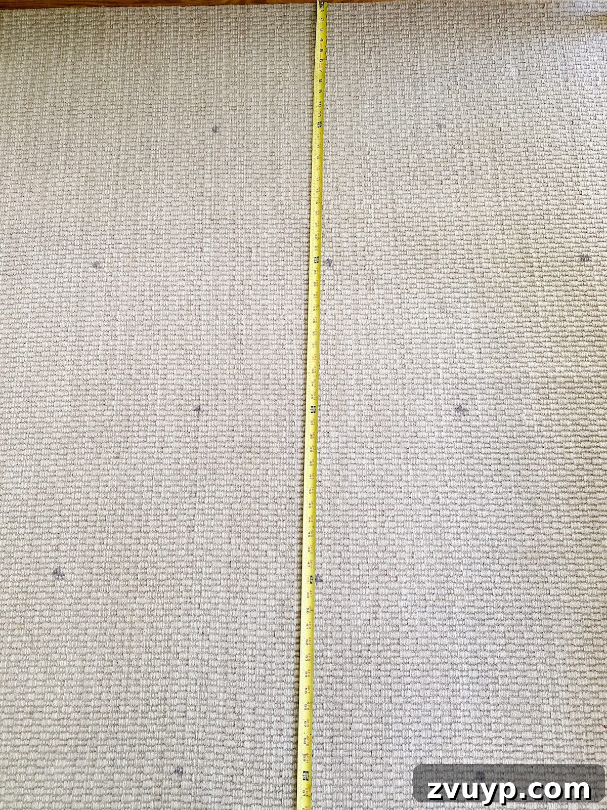 Craft a Custom Floral Outdoor Rug with a Cricut Stencil 17 Measuring a plain outdoor rug to create a grid pattern for stenciling