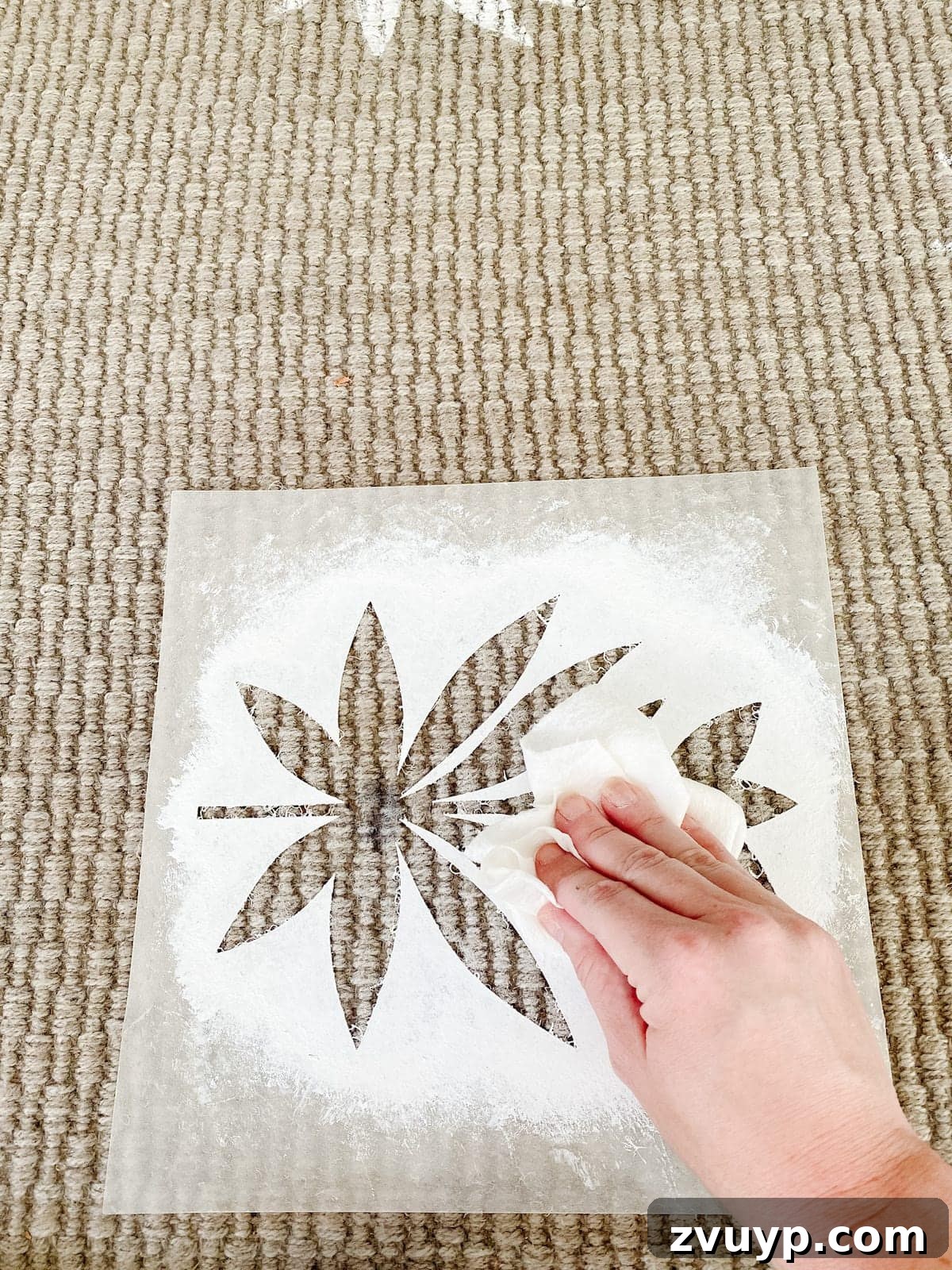 Craft a Custom Floral Outdoor Rug with a Cricut Stencil 19 Positioning the homemade floral block stencil over a marked dot on the outdoor rug