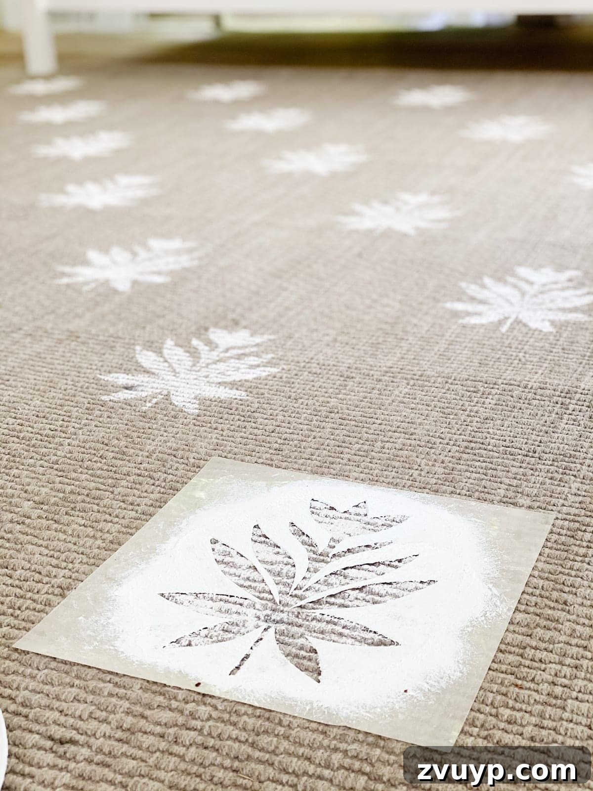 Craft a Custom Floral Outdoor Rug with a Cricut Stencil 22 Completed section of the DIY outdoor rug with new floral block pattern