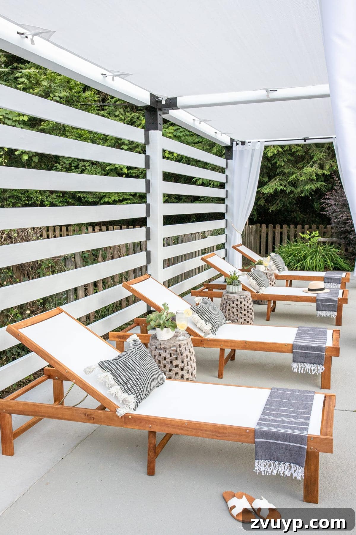 Build Your Own Backyard Oasis: A DIY Luxury Pool Cabana Pergola 10 pool lounge chairs under a white DIY pergola, showing seating arrangement