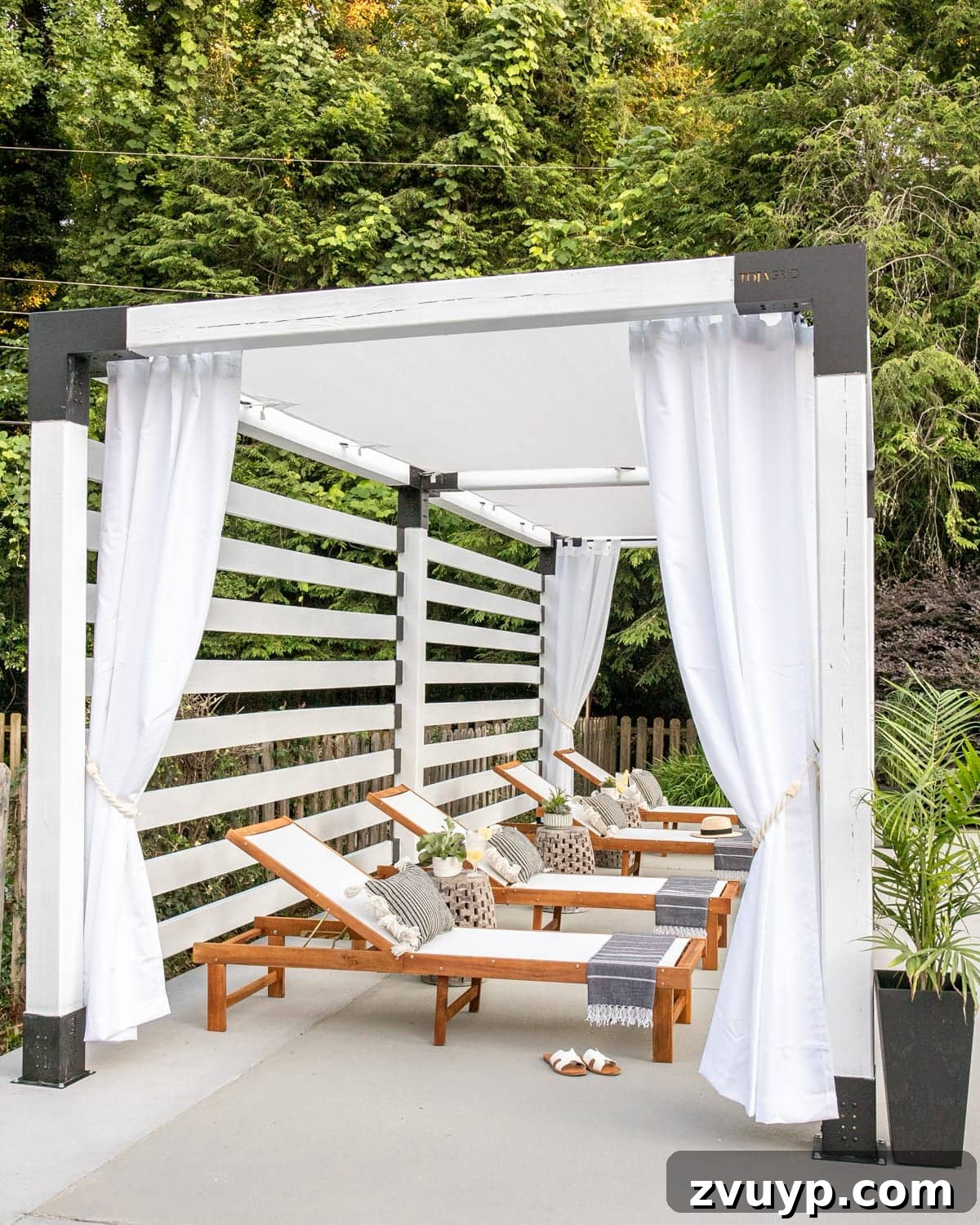 Build Your Own Backyard Oasis: A DIY Luxury Pool Cabana Pergola 8 outdoor lounge chairs under a white pergola cabana with outdoor curtains draped elegantly