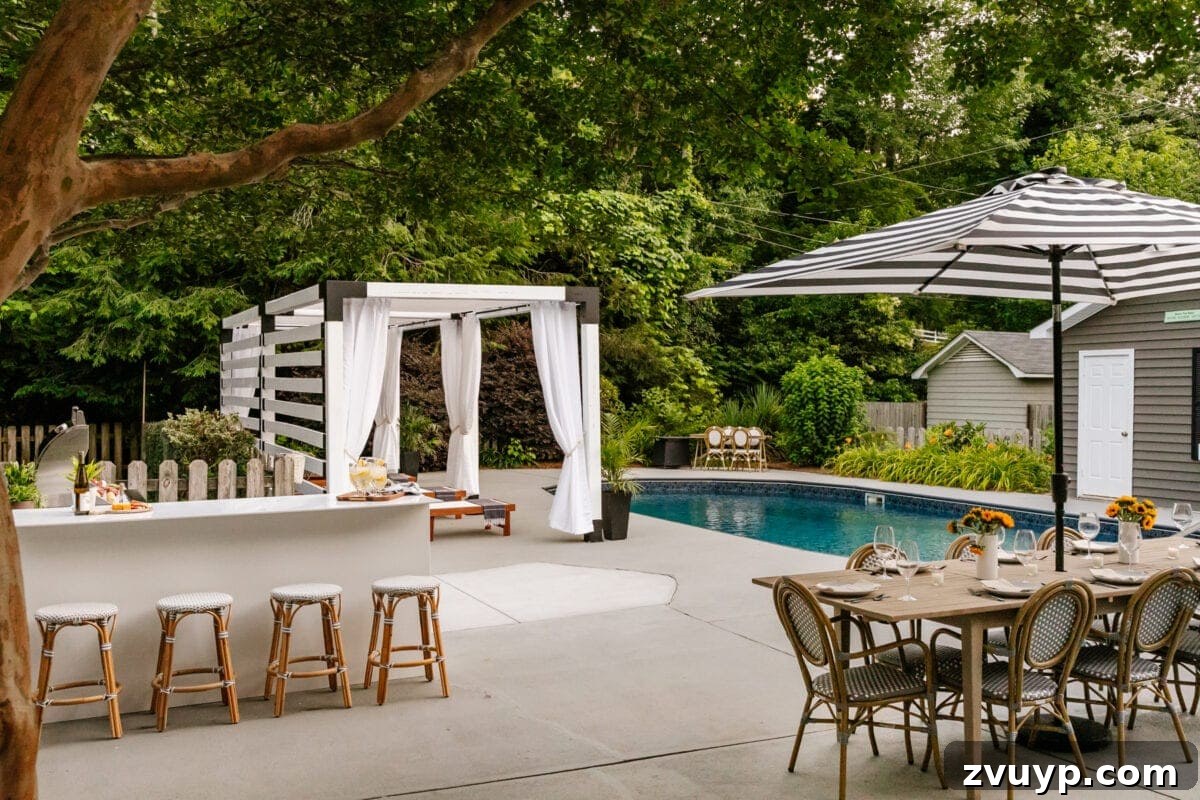 Effortless DIY Outdoor Kitchen Kit Build: Essential Tips 6 A stunning 'after' shot of a DIY pergola cabana, modular outdoor kitchen, and dining area by a beautifully updated swimming pool.