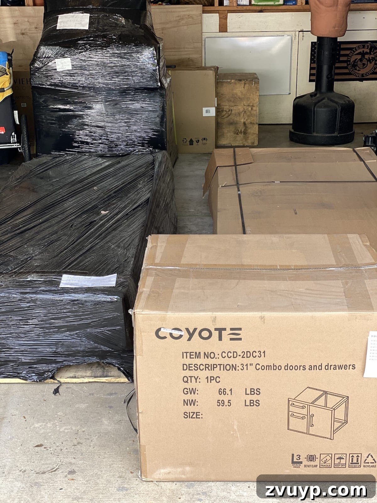 Effortless DIY Outdoor Kitchen Kit Build: Essential Tips 8 Pallets stacked with boxes containing the delivered DIY outdoor kitchen kit components, ready for assembly.