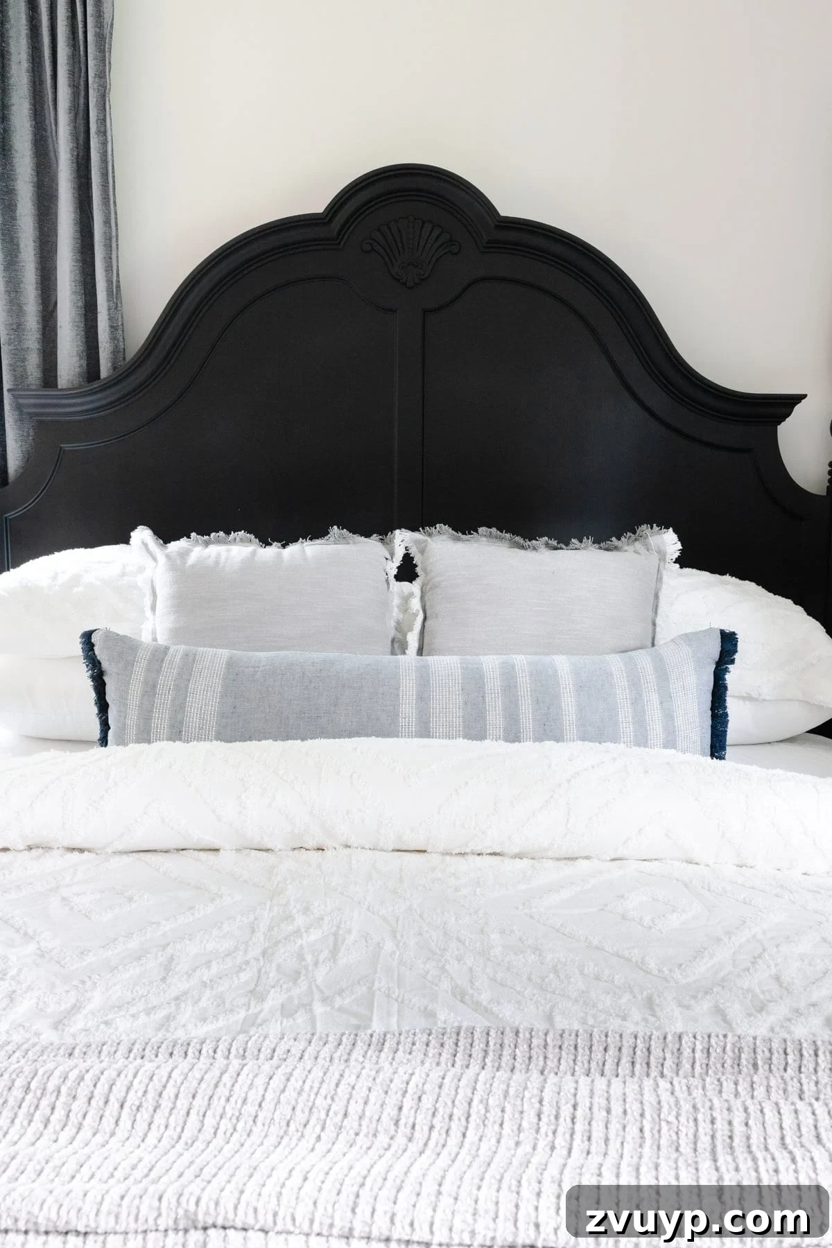 Small Space, Big Impact: 10 Bedroom Design Secrets 8 black painted poster bed with white bedding