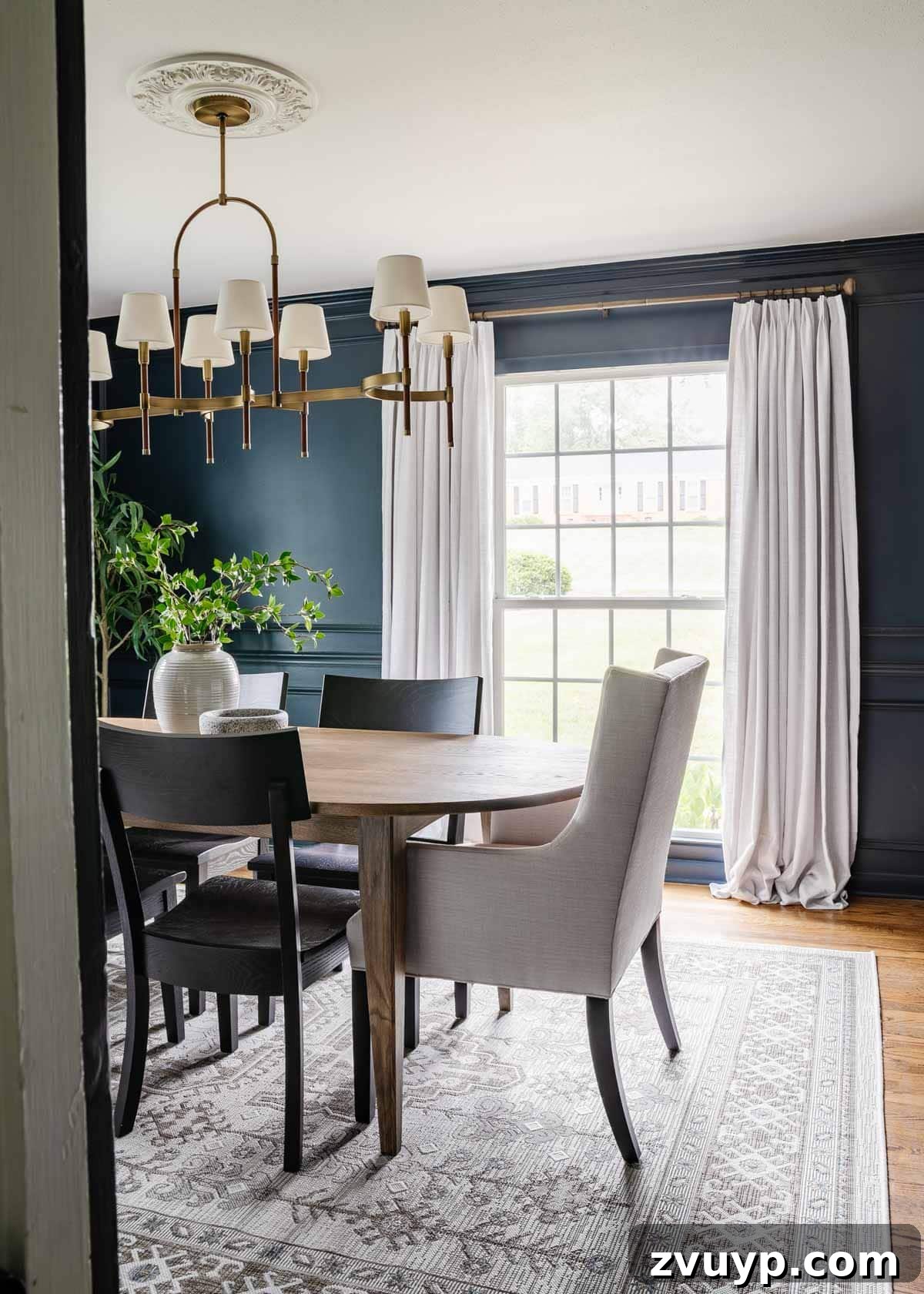 Bassett BenchMade Classic Modern Dining Refined 13 Overall view of the classic modern dining room with mid-century modern dining table and harmonious decor