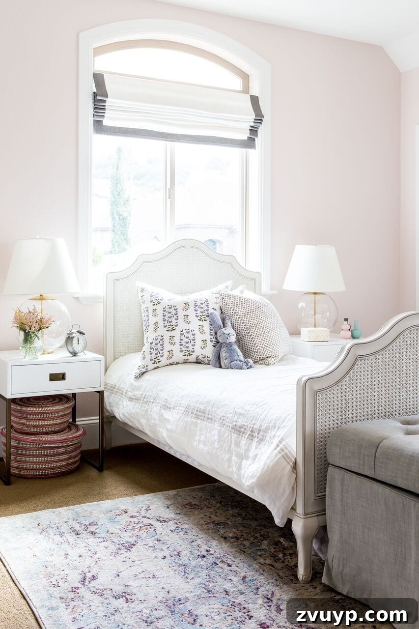 Benjamin Moore Melted Ice Cream - little girl's bedroom with soft pink walls, creating a creamy and warm atmosphere.