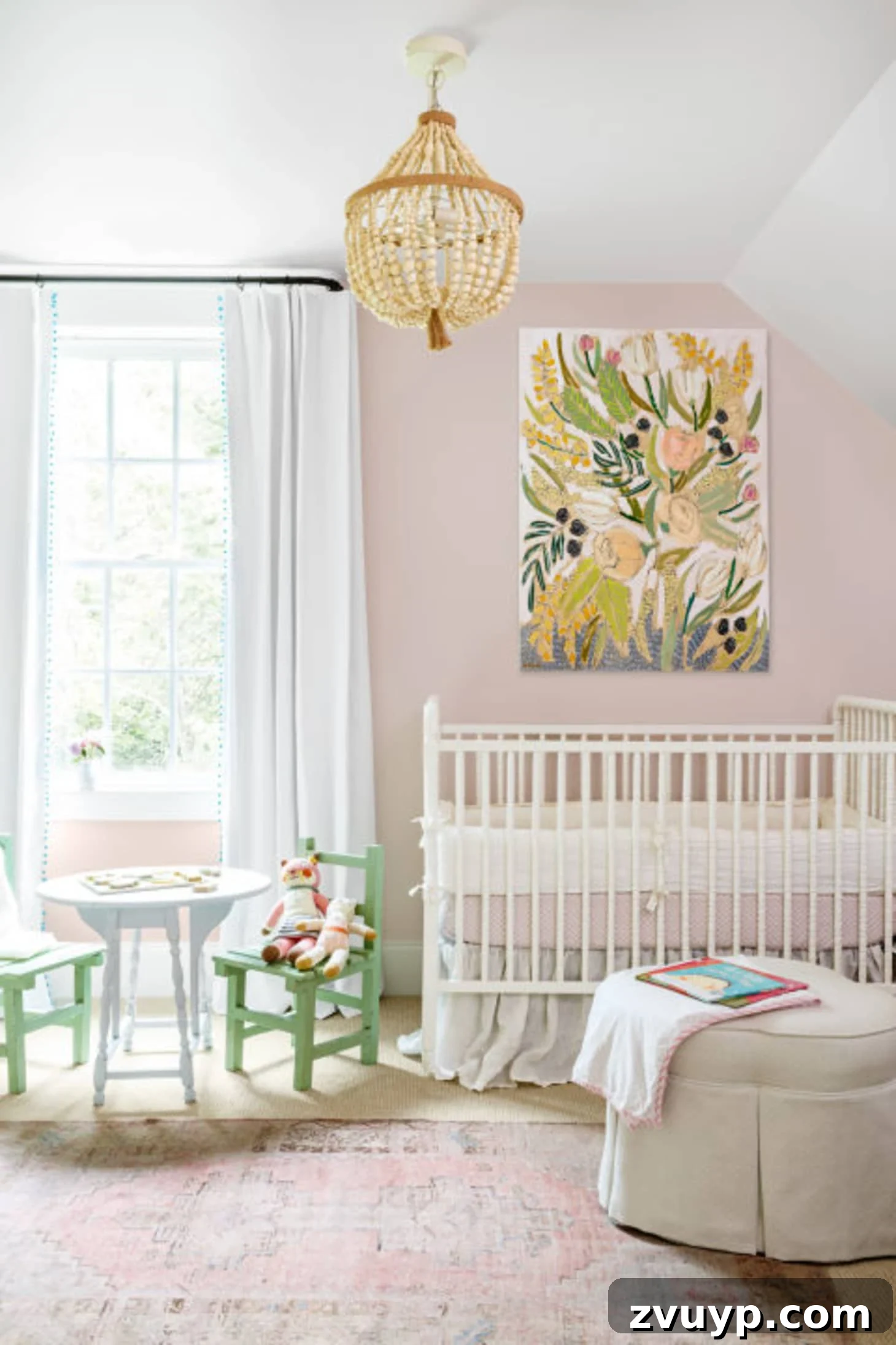 Sherwin Williams Intimate White - pink nursery with gentle, muted pink walls, creating a calm and soothing environment.