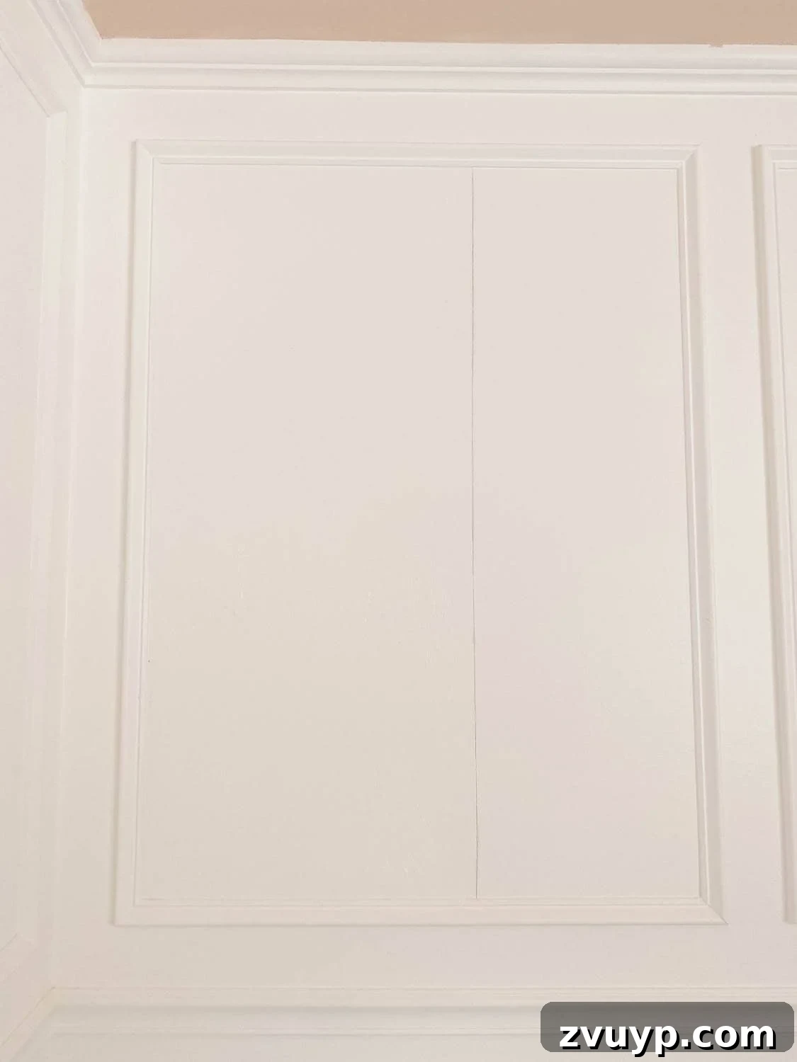 Transforming Walls with Framed Wallpaper Inserts 6 setting a plumb line for hanging wallpaper