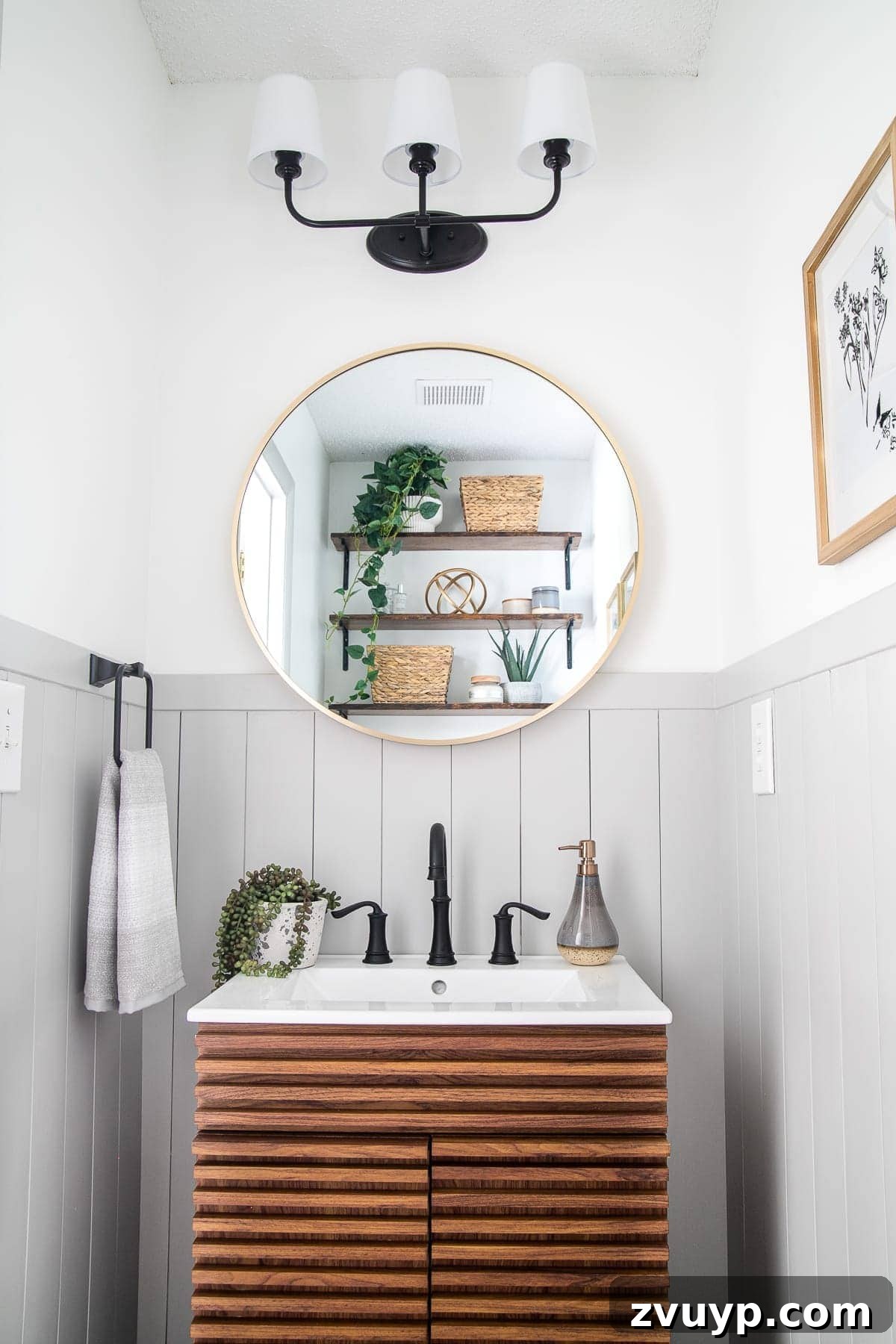Elevate Your Space: Stylish Wood Vanities for Every Budget 4 Warm wood bathroom vanity in a California casual powder room against grey shiplap