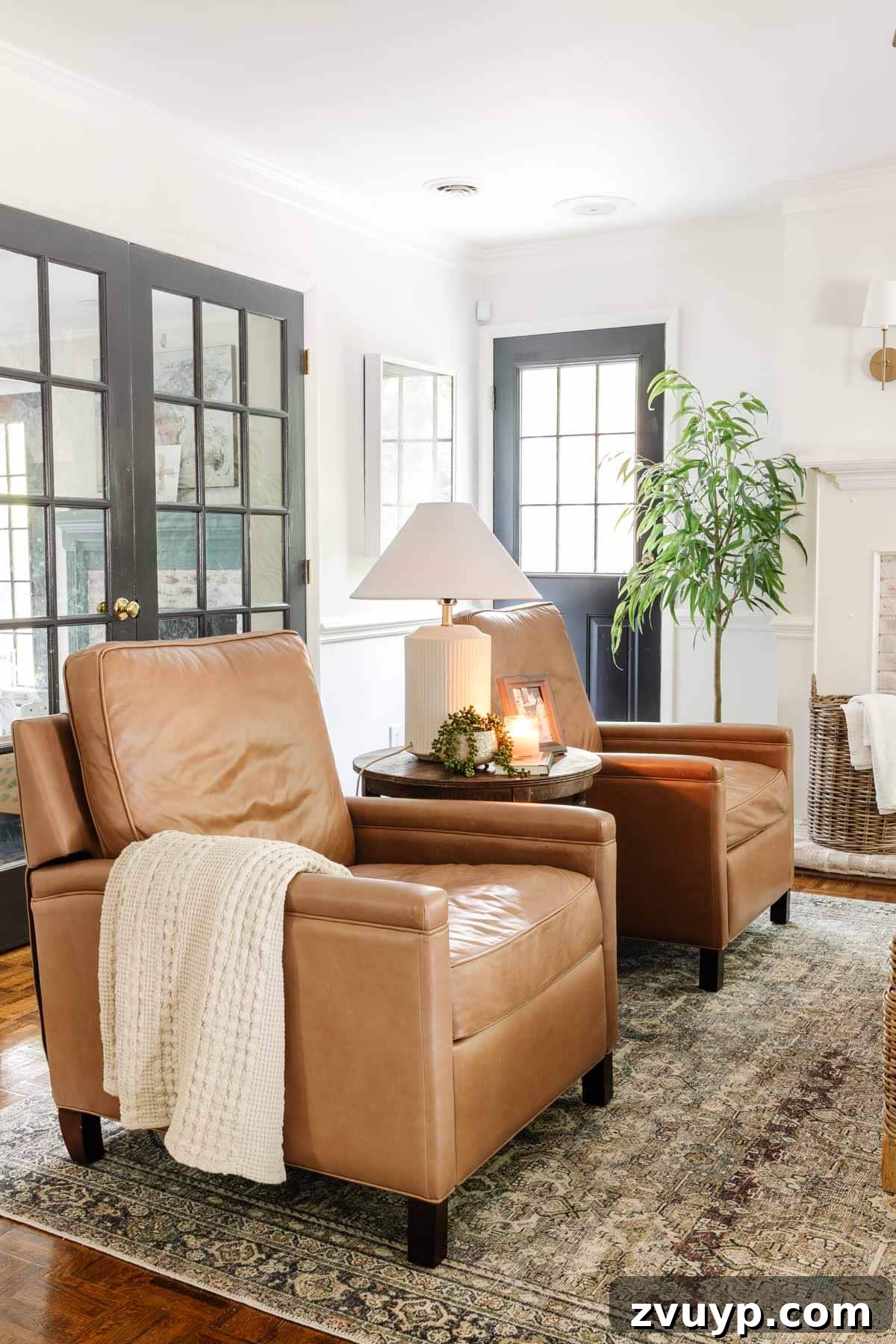 Pottery Barn Tyler square arm recliners stylishly arranged in a modern living room setting