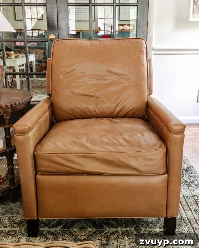 Detail of down blend cushions on a Pottery Barn Tyler recliner, showing their plush yet supportive nature