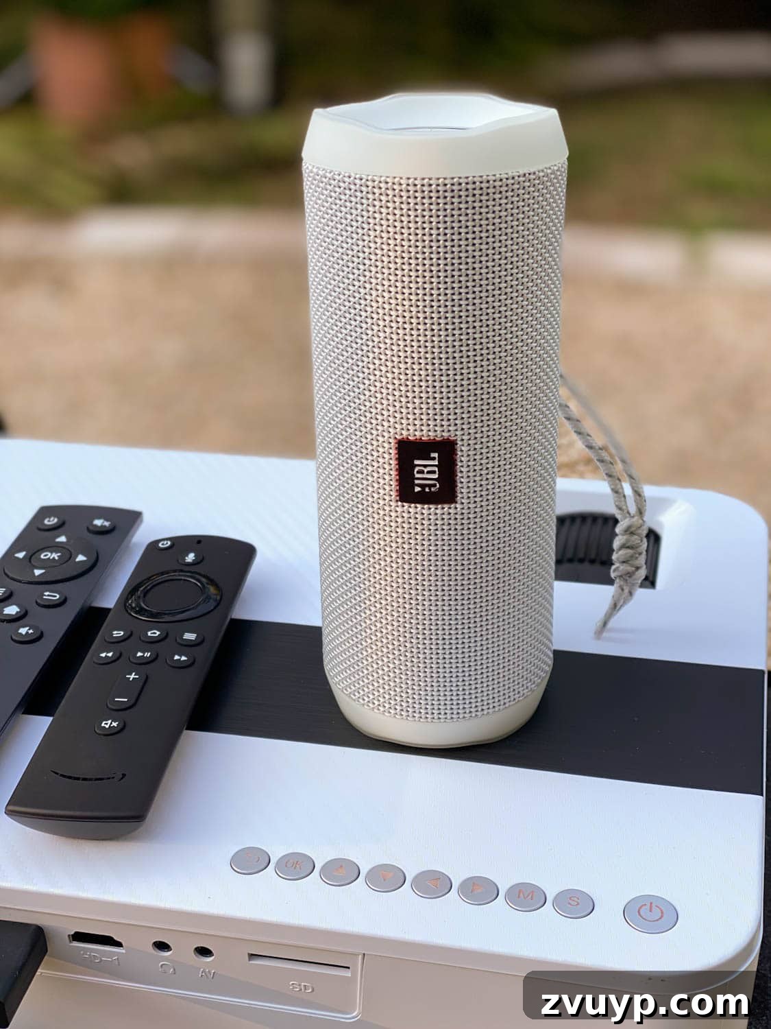 Create an Epic Backyard Movie Night Without Breaking the Bank 11 how to set up a bluetooth speaker with an outdoor movie projector