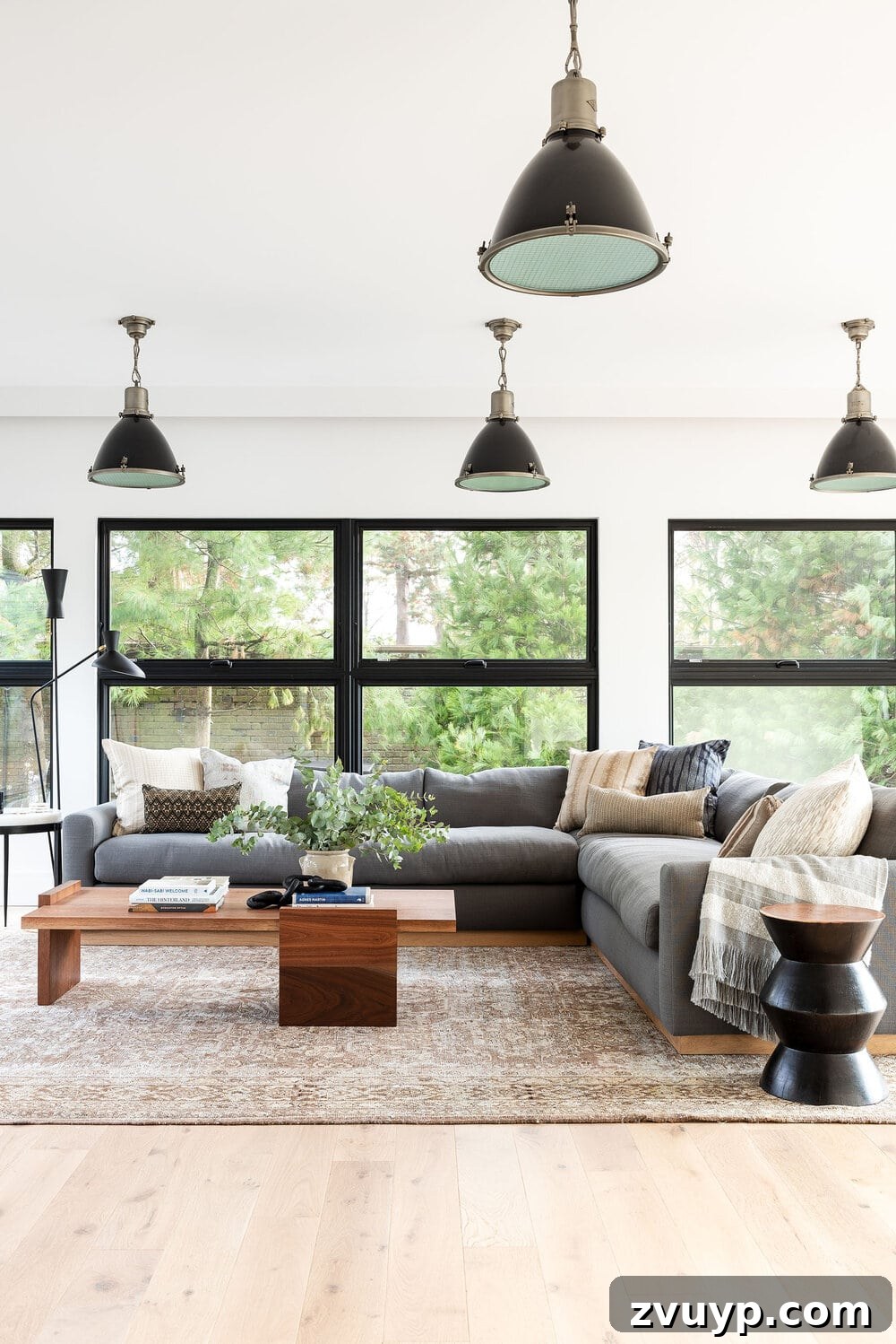 The Off White Paints Designers Swear By 11 Sherwin Williams White Flour paint color in a cozy living room