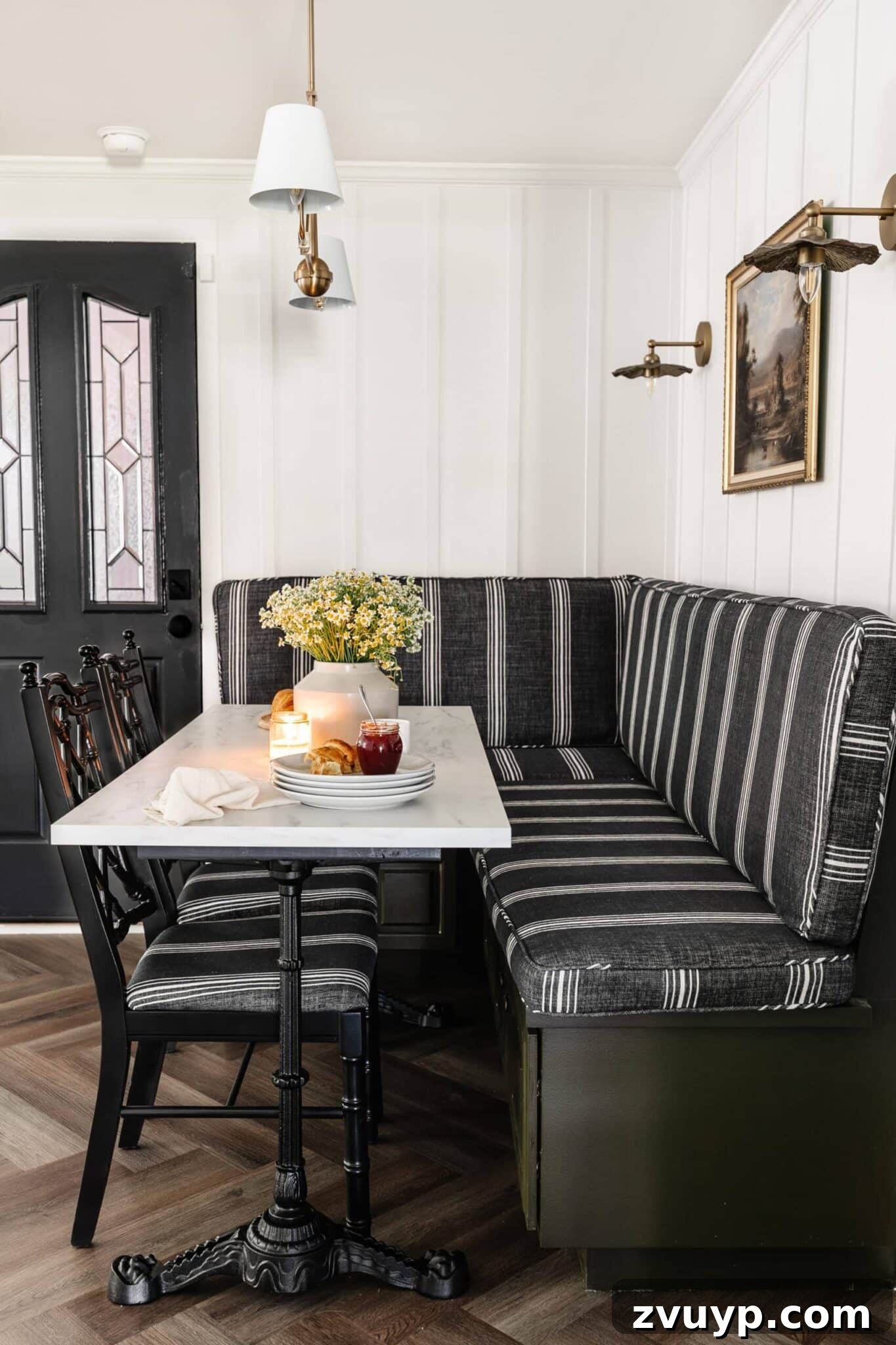 The Off White Paints Designers Swear By 14 Breakfast nook banquette with marble dining table painted in a beautiful off-white color