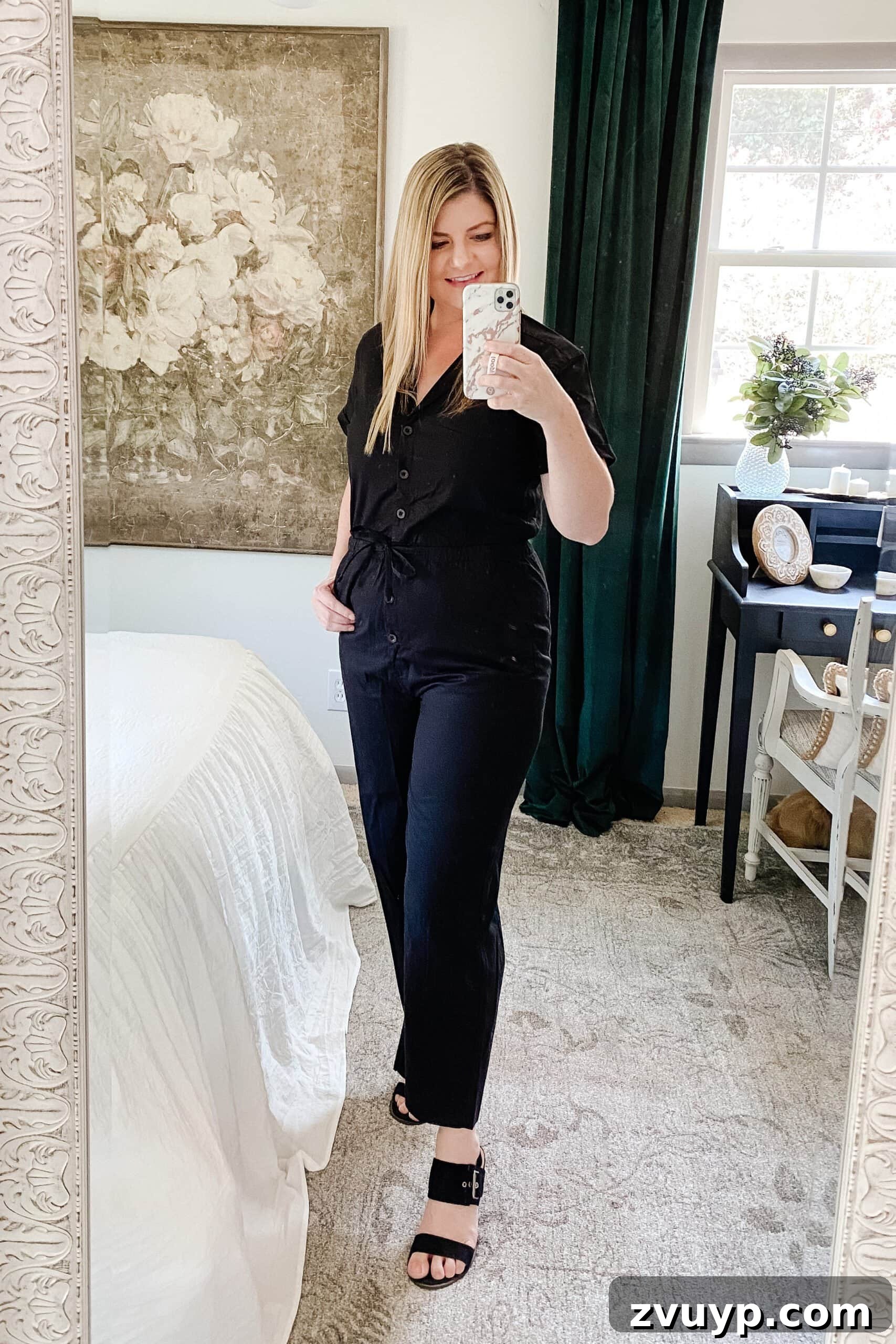 Unlock a Slimmer You: 6 Fall Outfits for Effortless Style 8 Slimming fall outfit idea: dark v-neck button front jumpsuit and heeled sandals