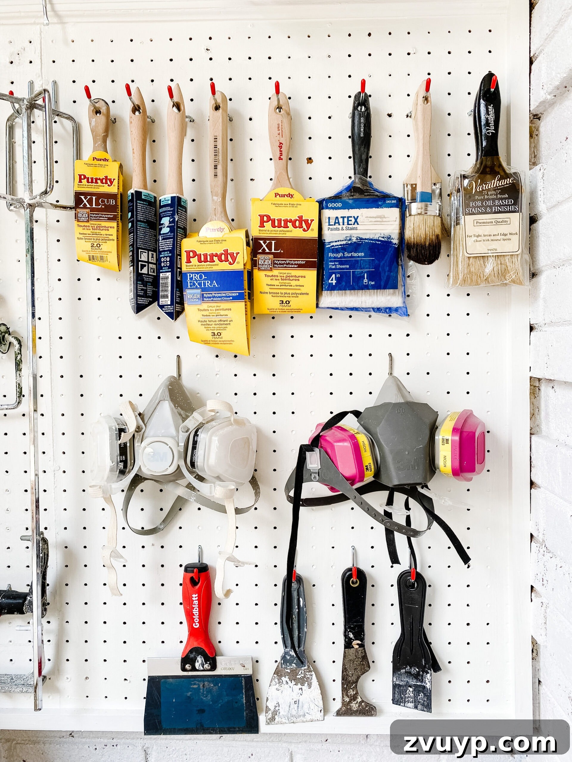 Clever Paint Storage Closet Solutions 11 pegboard hooks with paint brushes