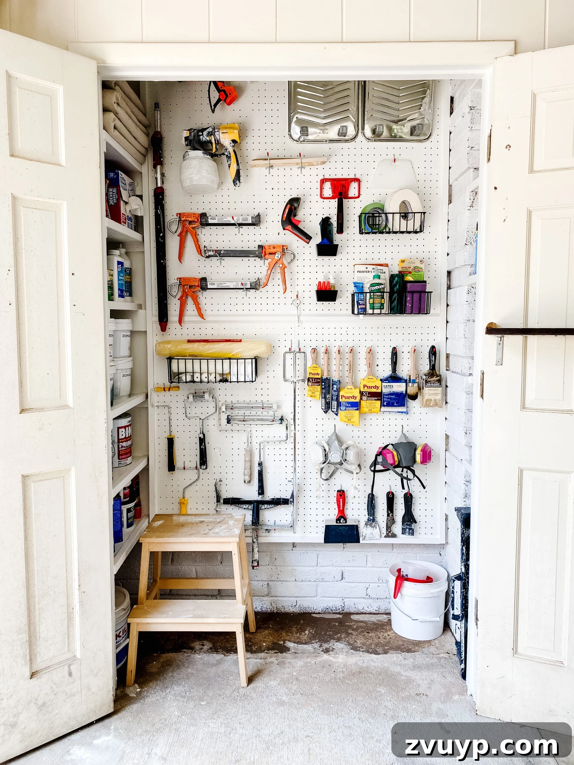 Clever Paint Storage Closet Solutions 4 organized paint storage closet with pegboard hooks and DIY shelves