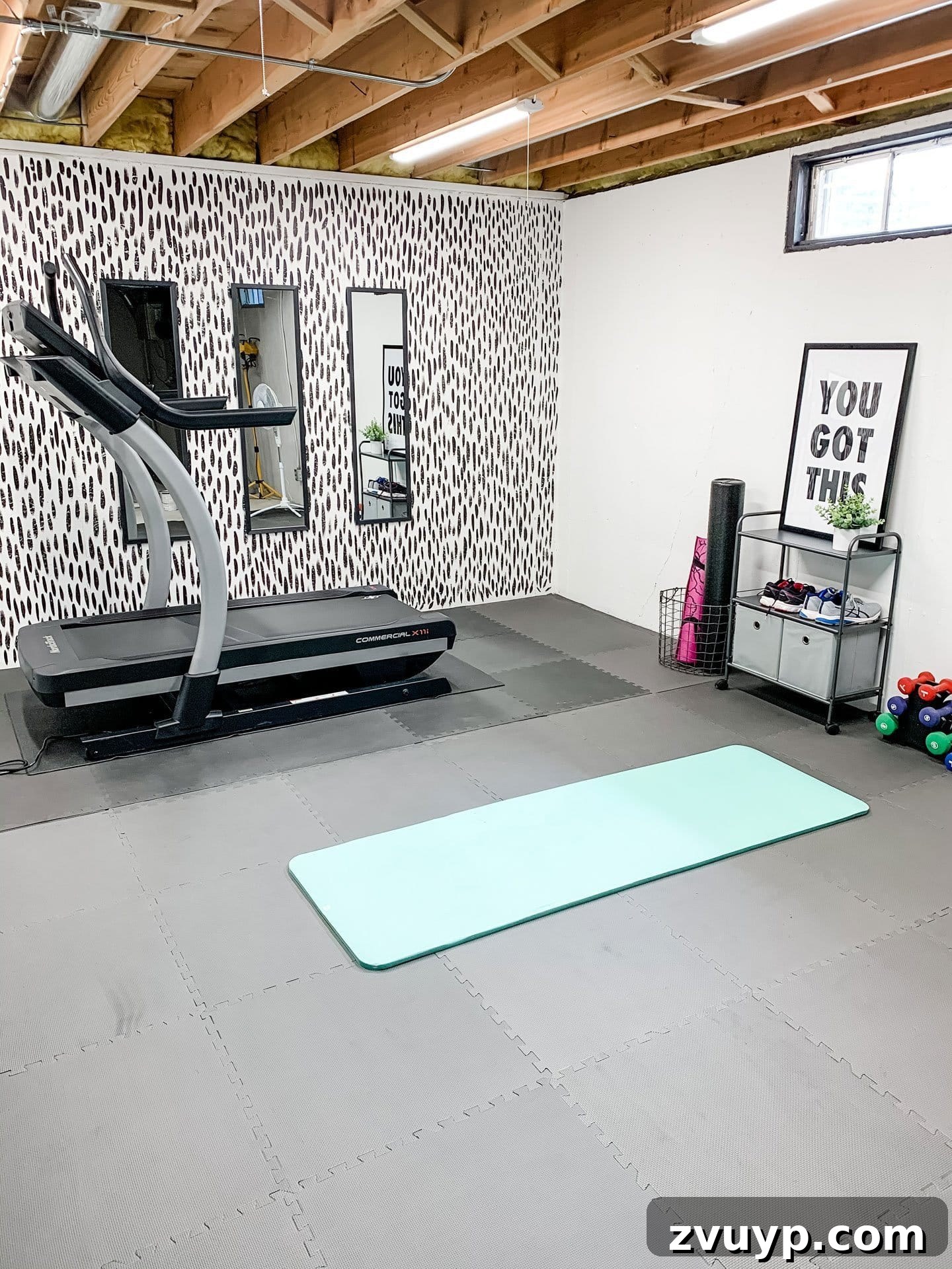 Transform Your Space: Home Gym Ideas for Basements, Garages, and Sheds 12 Home gym in a basement featuring a brushstroke accent wall