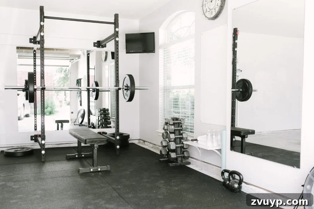 Transform Your Space: Home Gym Ideas for Basements, Garages, and Sheds 13 Home gym with a padded rubber floor and various weights
