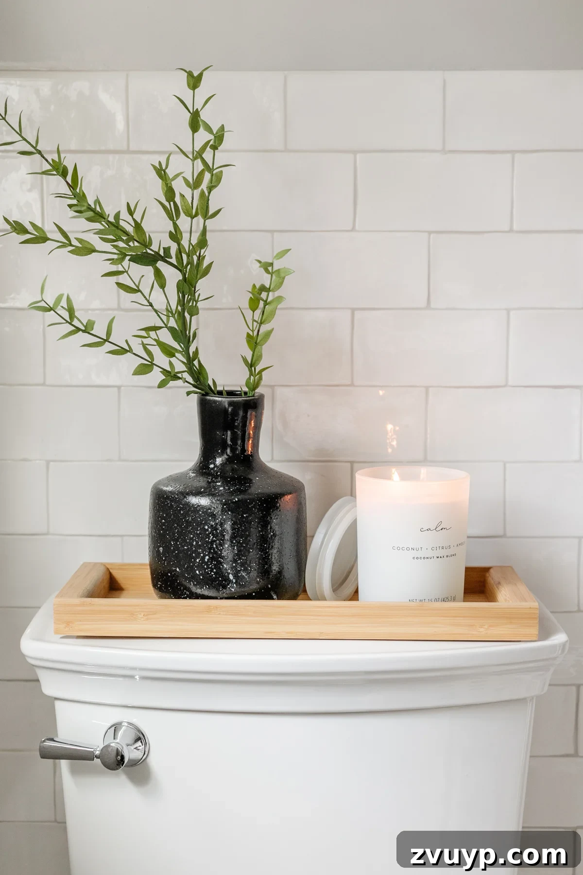 High-Contrast Haven: Black and White Bathroom Updates 12 toilet tank decor
