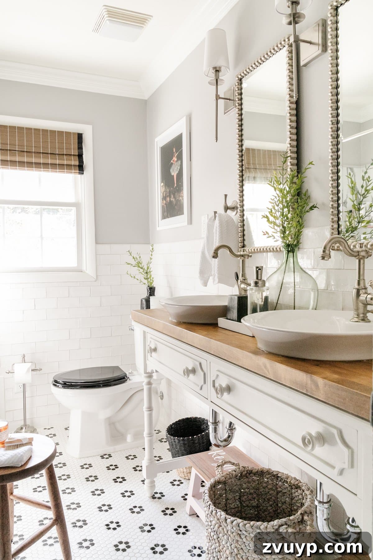 High-Contrast Haven: Black and White Bathroom Updates 4 classic black and white bathroom decor with retro tile and Chippendale bamboo style vanity