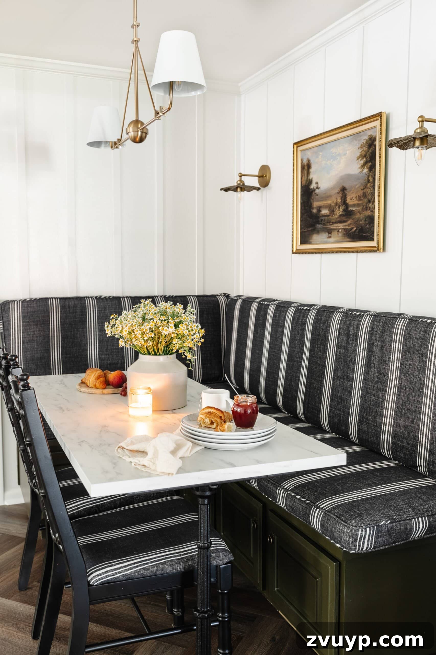 banquette in a breakfast nook with striped cushions