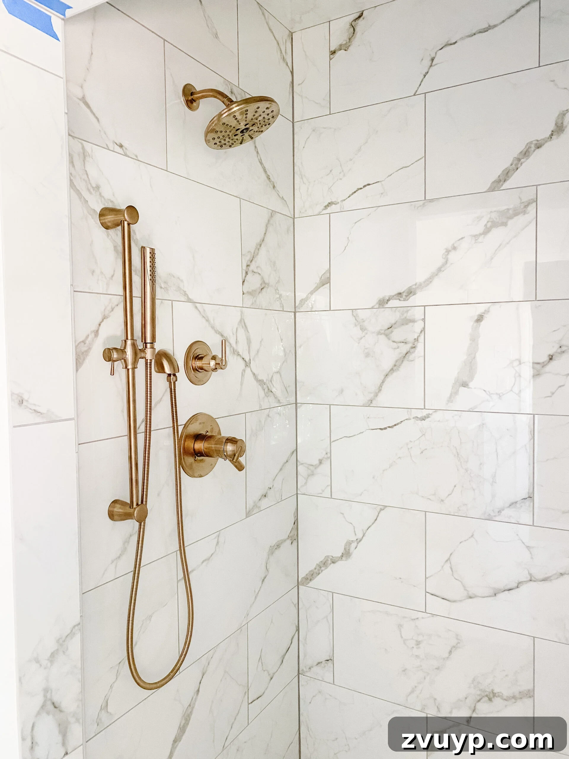 Our En Suite Bathroom Remodel: Faucets Are Finally In! 9 champagne bronze shower faucets in en suite bathroom