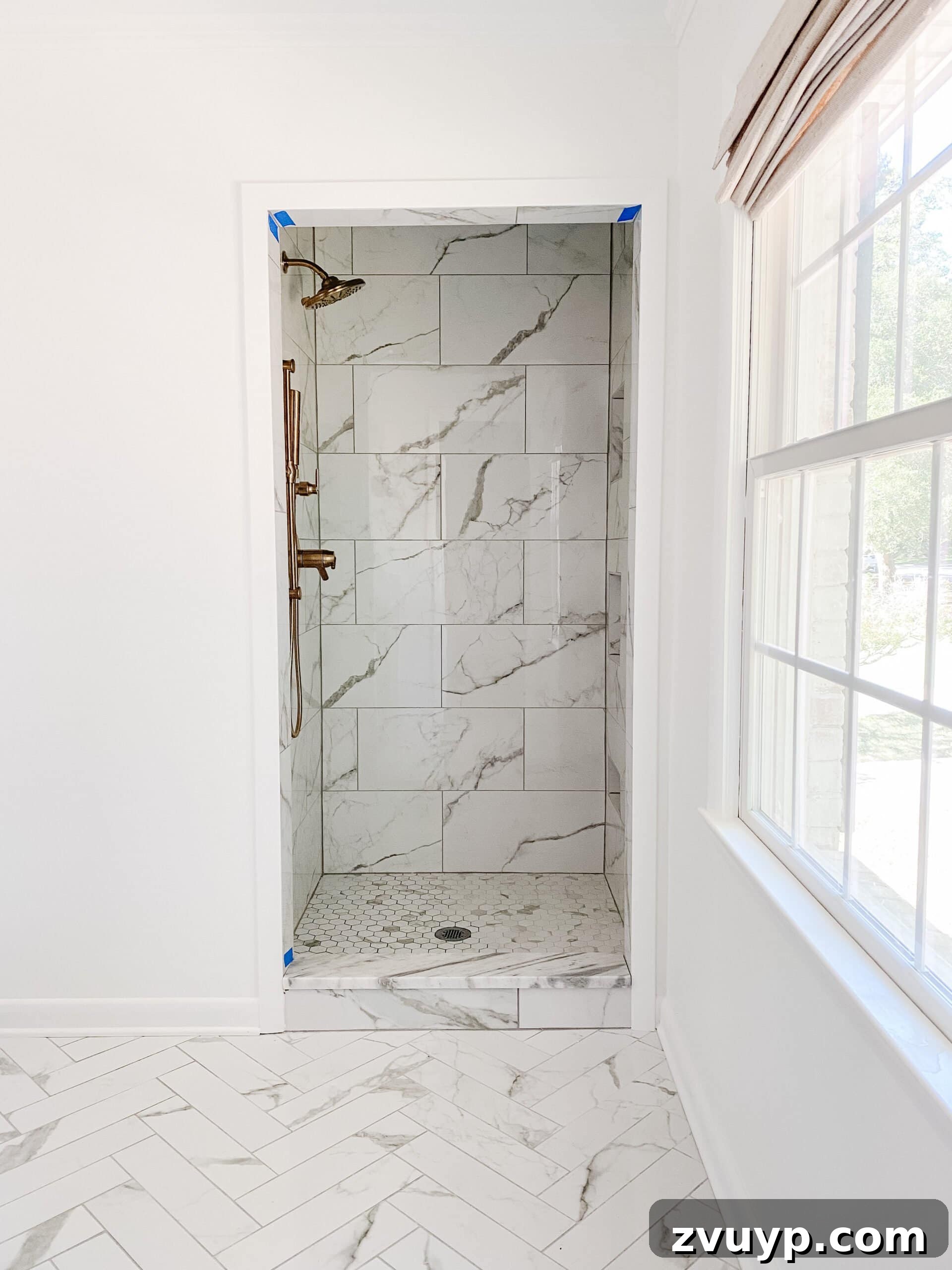 Our En Suite Bathroom Remodel: Faucets Are Finally In! 10 faux marble porcelain tile shower