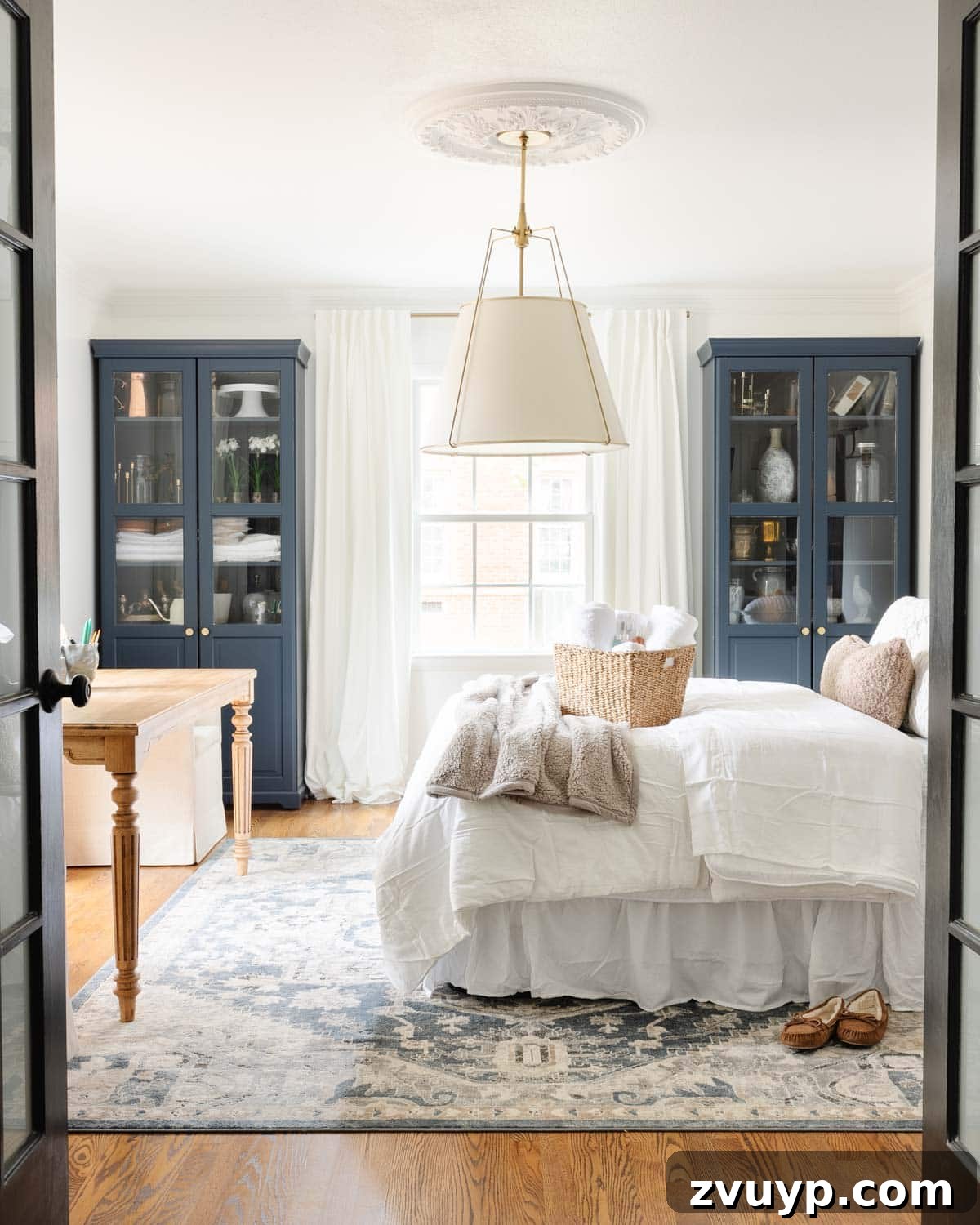 12 Brilliant Air Mattress Hacks for the Ultimate Guest Experience 2 a home office set up as a temporary guest room and making an air mattress comfortable like a real bed