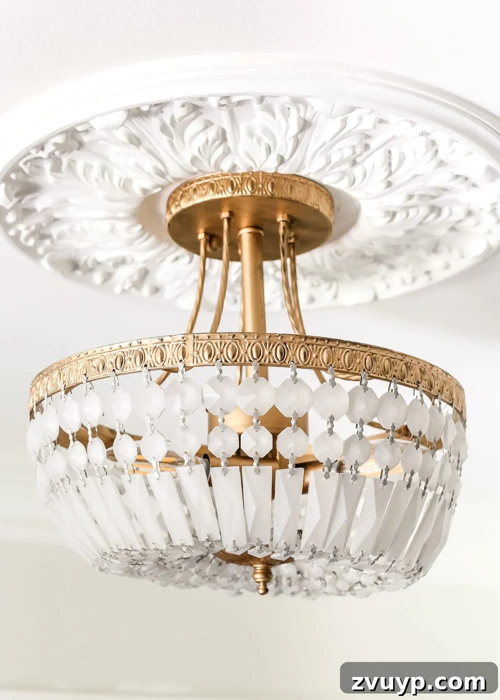 Mastering Rub n Buff: A Comprehensive Color and Technique Guide 6 The stunning result of a light fixture makeover using Rub n Buff Antique Gold