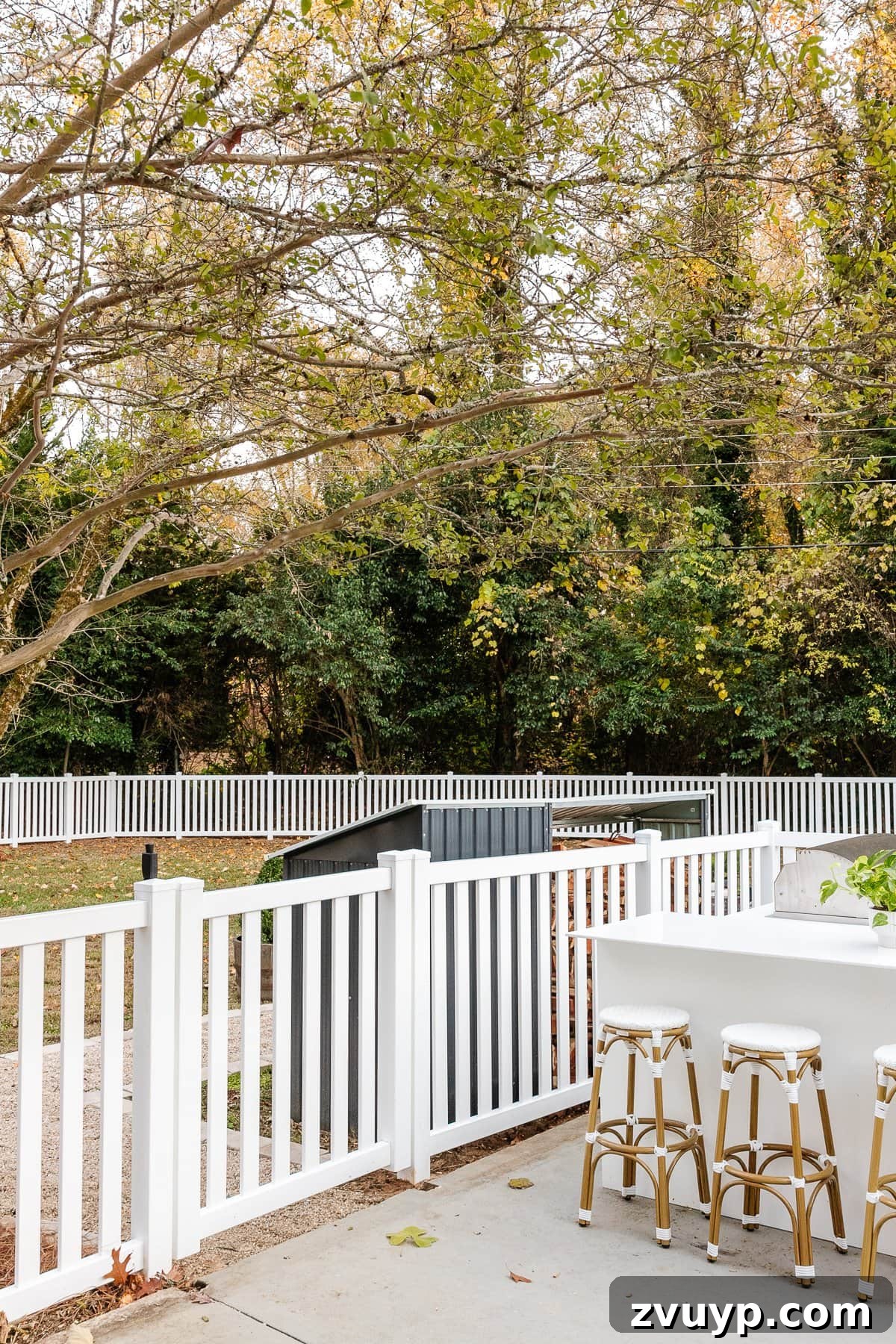 Vinyl Fence Installation Made Easy: Your Ultimate Guide 15 backyard with new white vinyl fence installation