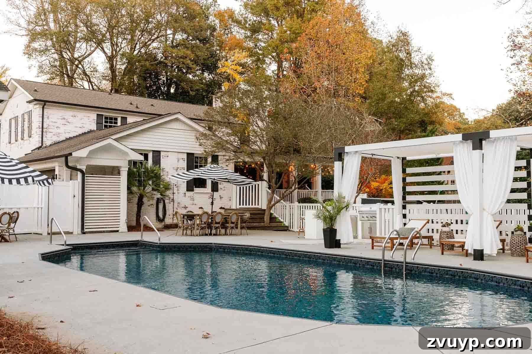 Vinyl Fence Installation Made Easy: Your Ultimate Guide 27 backyard pool after with pergola, new swimming pool liner, outdoor furniture, and outdoor kitchen