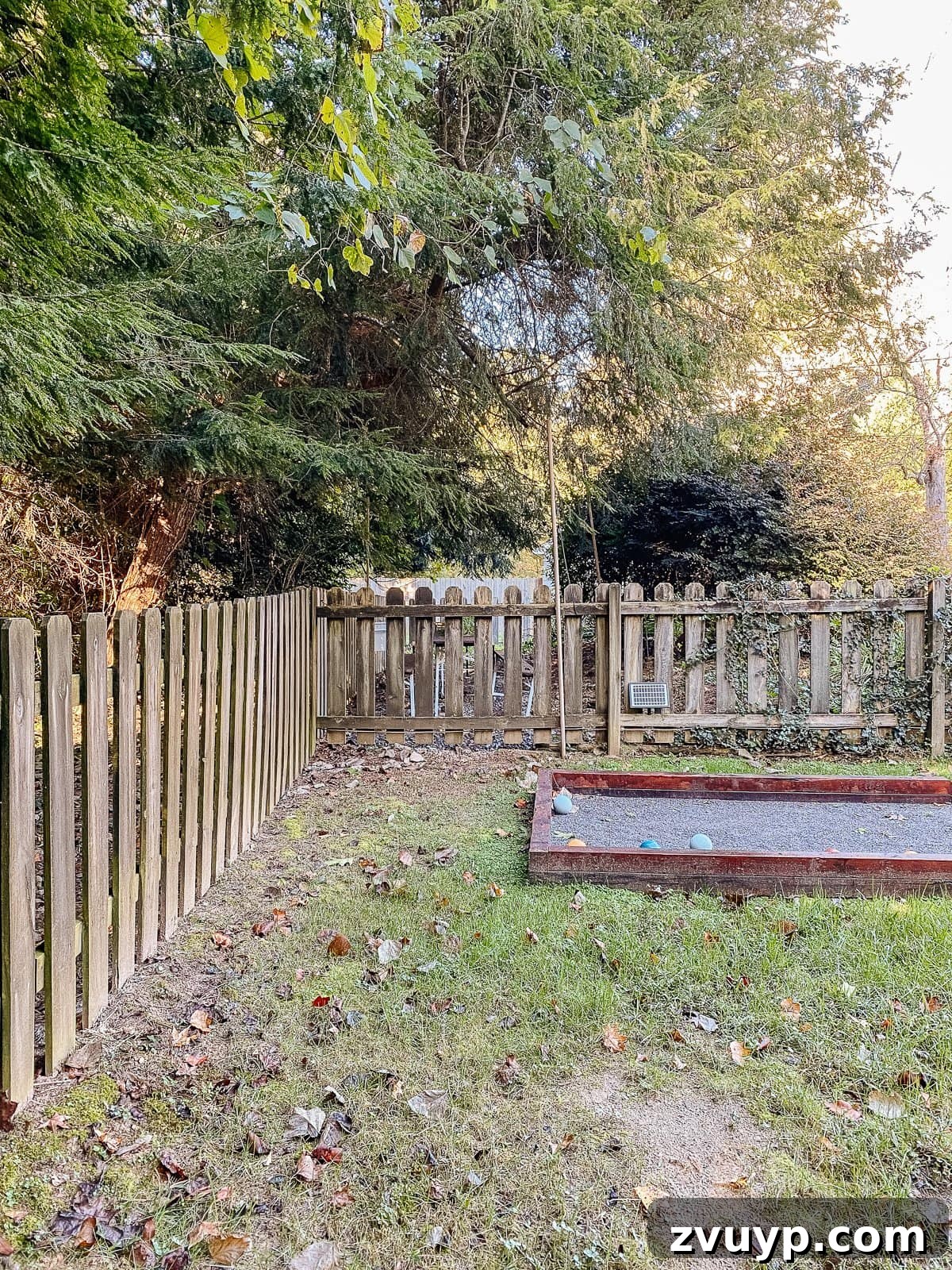 Vinyl Fence Installation Made Easy: Your Ultimate Guide 9 backyard bocce ball court with wood fencd