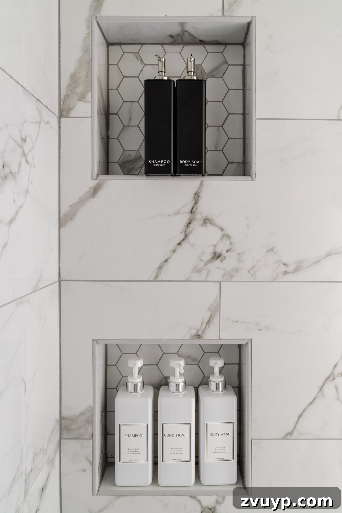 The Perfect Blend: Modern Vintage En Suite Bathroom Tour 16 Organized shower niches featuring sleek soap dispensers and decorative hexagon tile accents, designed for practicality and aesthetics