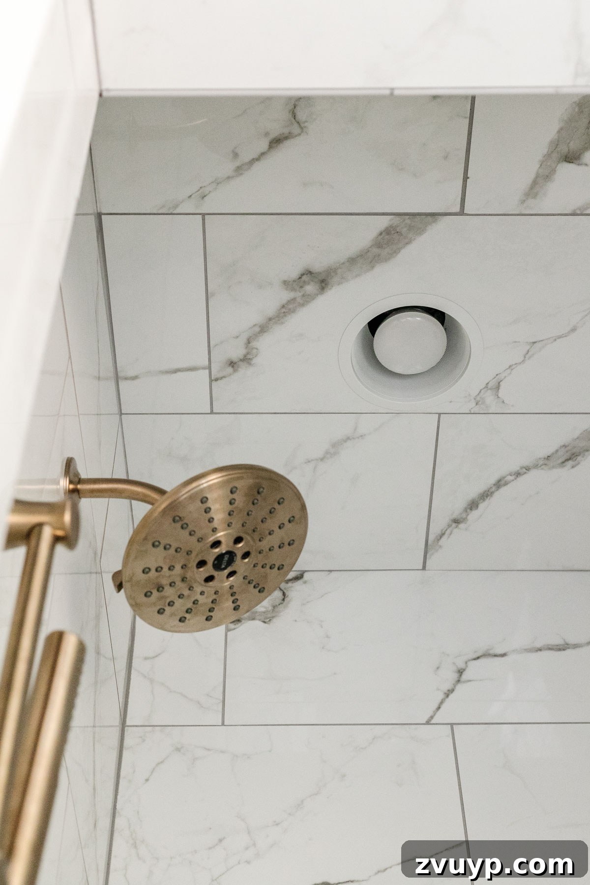 The Perfect Blend: Modern Vintage En Suite Bathroom Tour 23 Recessed canned light and fan in the shower, offering discreet lighting and ventilation for a sleek bathroom design