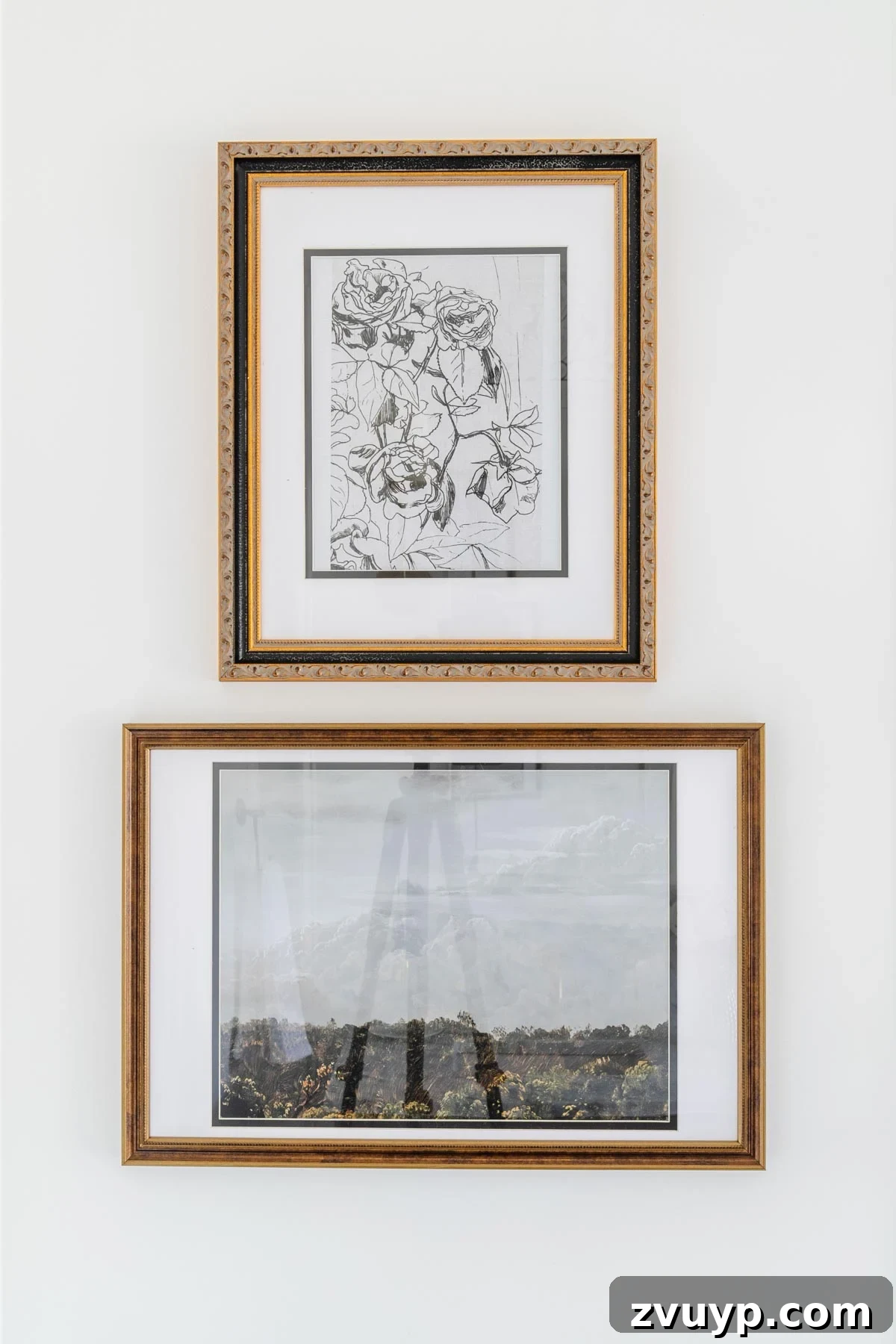 The Perfect Blend: Modern Vintage En Suite Bathroom Tour 27 Modern vintage bathroom art featuring a floral etching and a landscape painting in elegant black and gold frames, adding subtle sophistication